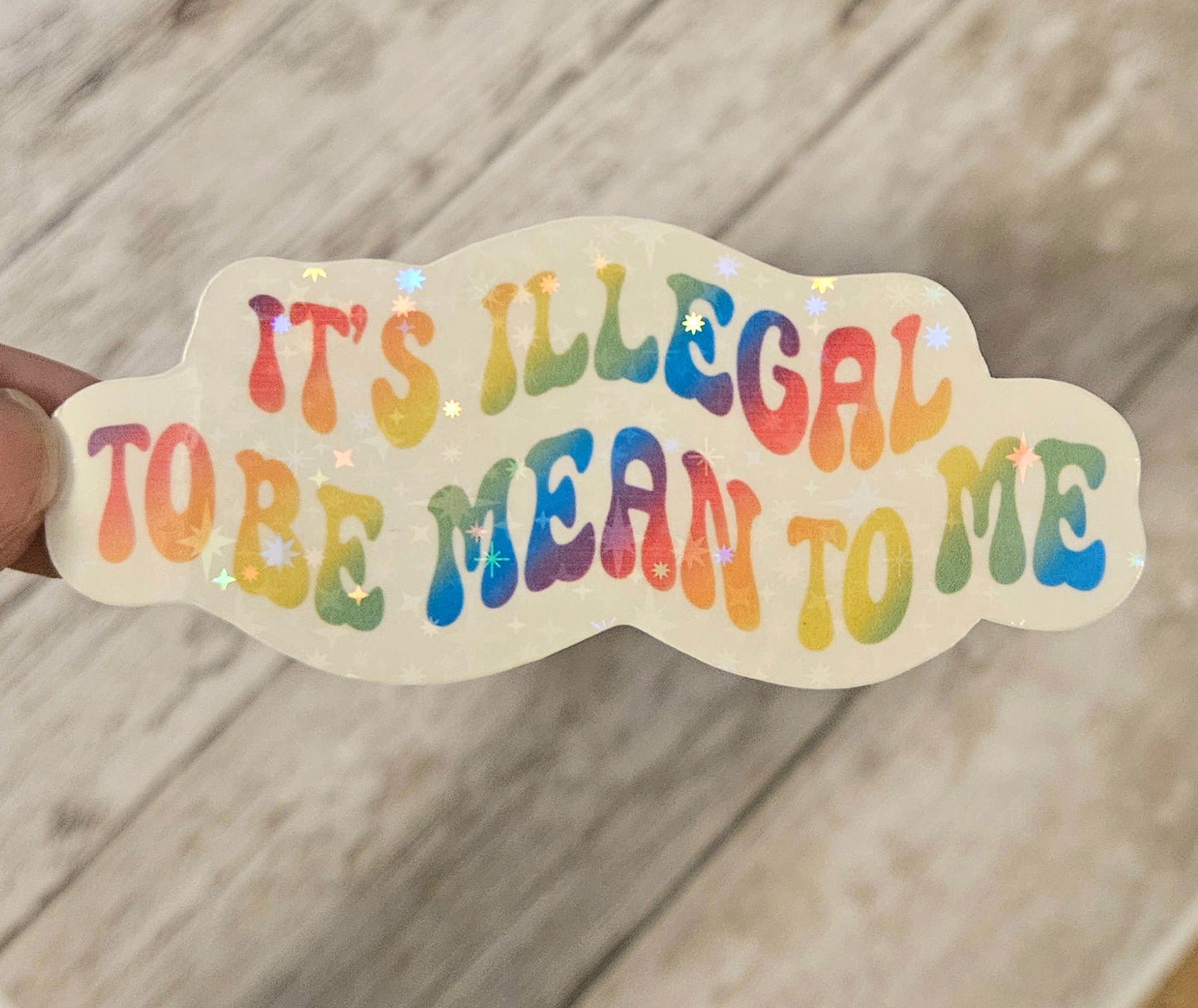 It's illegal to be mean to me sticker