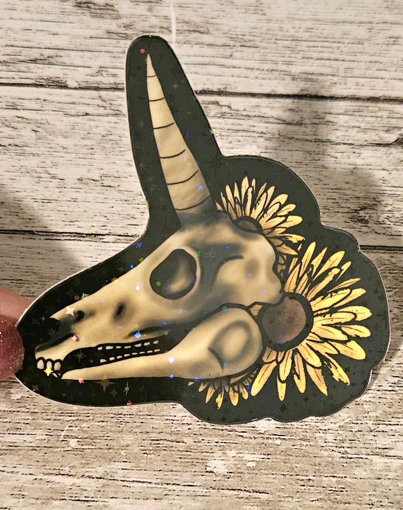 Glow in the dark unicorn skull sticker