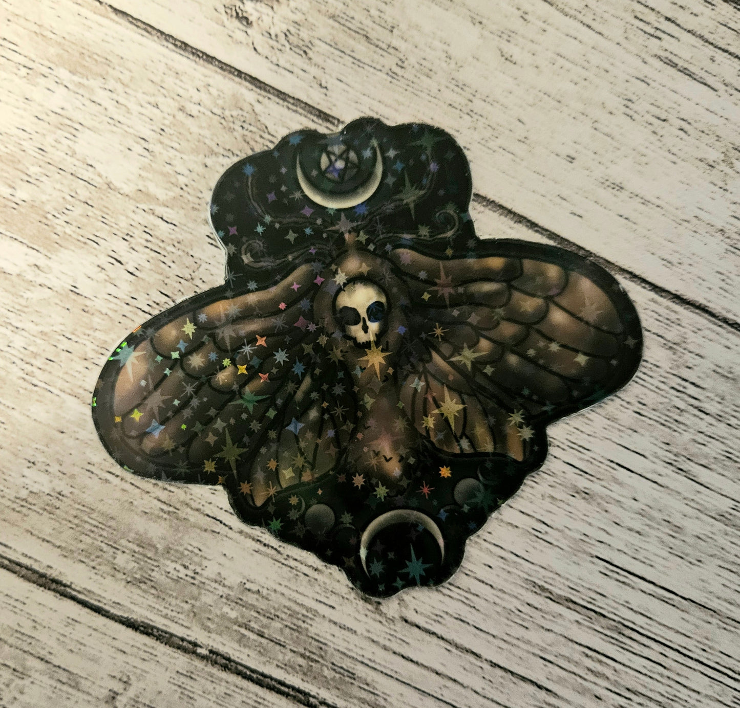 Glow in the death moth sticker