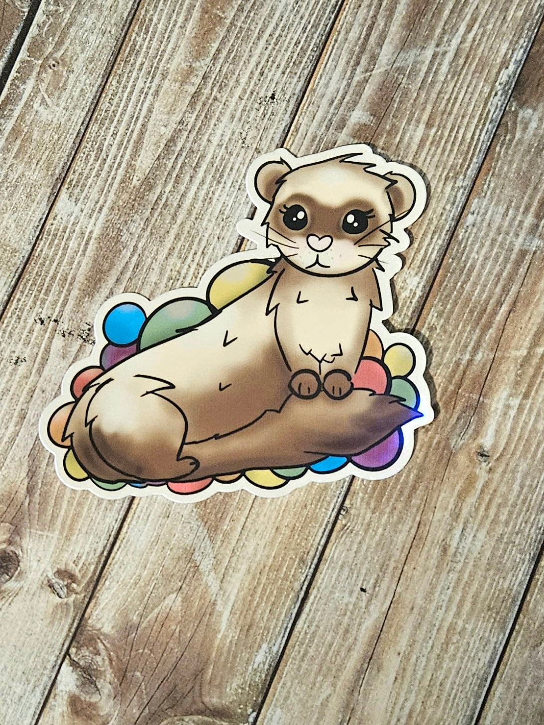 Adorable ferret in a ball pit sticker for water bottle