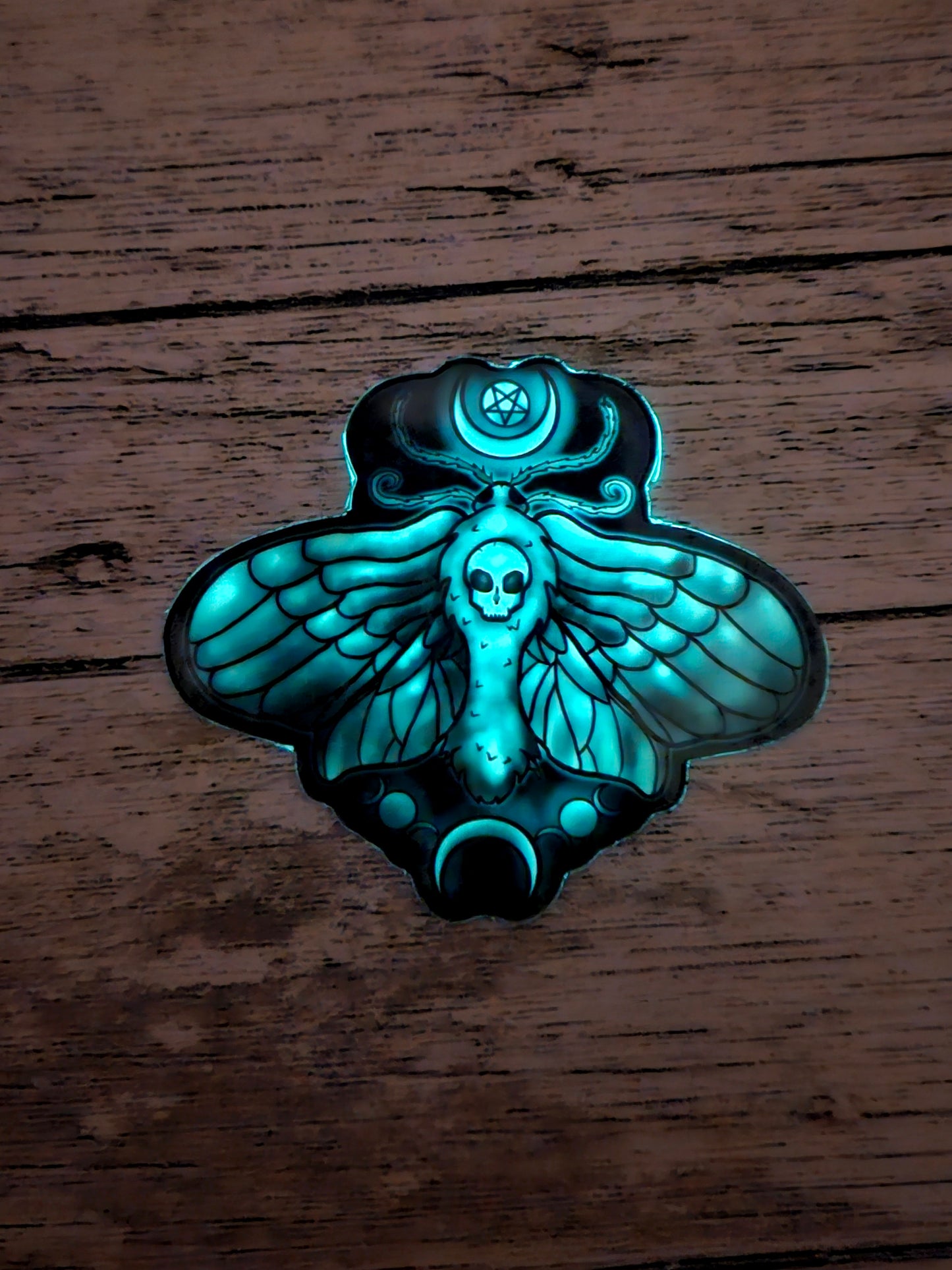 Glow in the death moth sticker