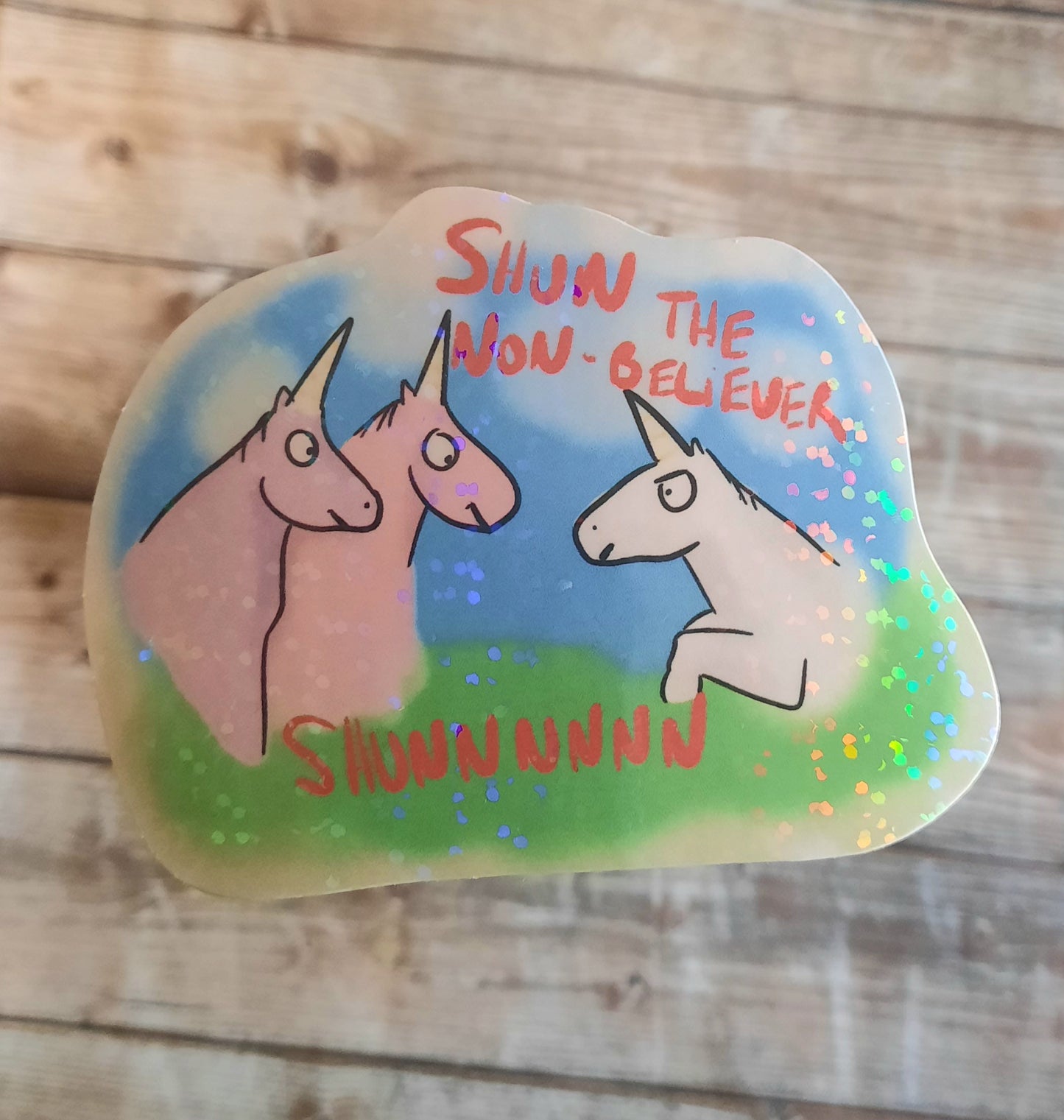 Shun the non believer unicorn sticker