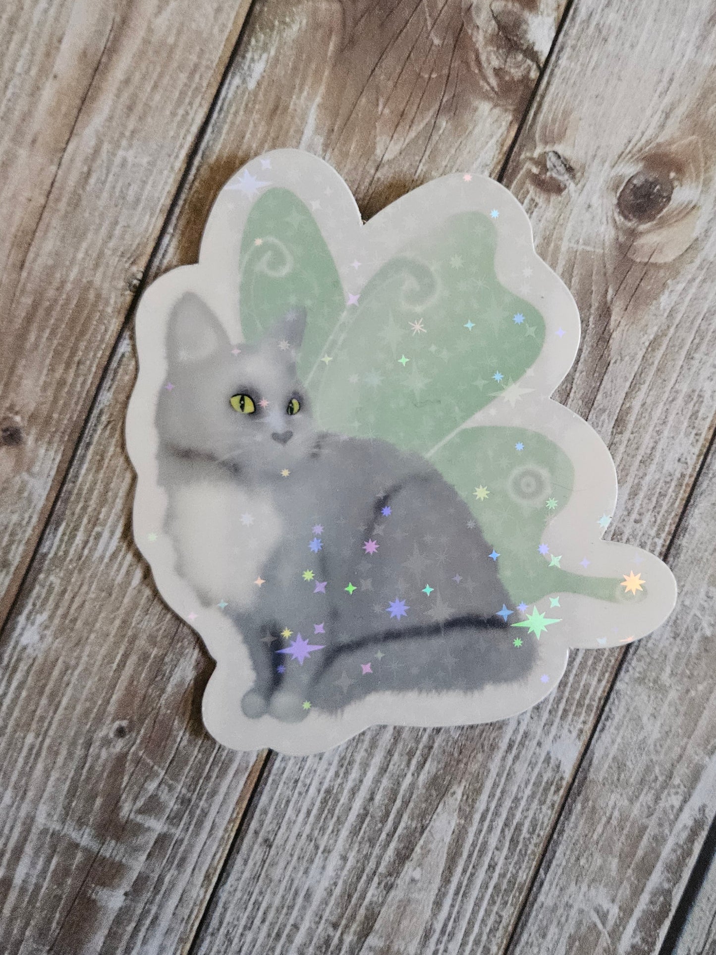 Gray cat with fairy wings sticker for water bottle