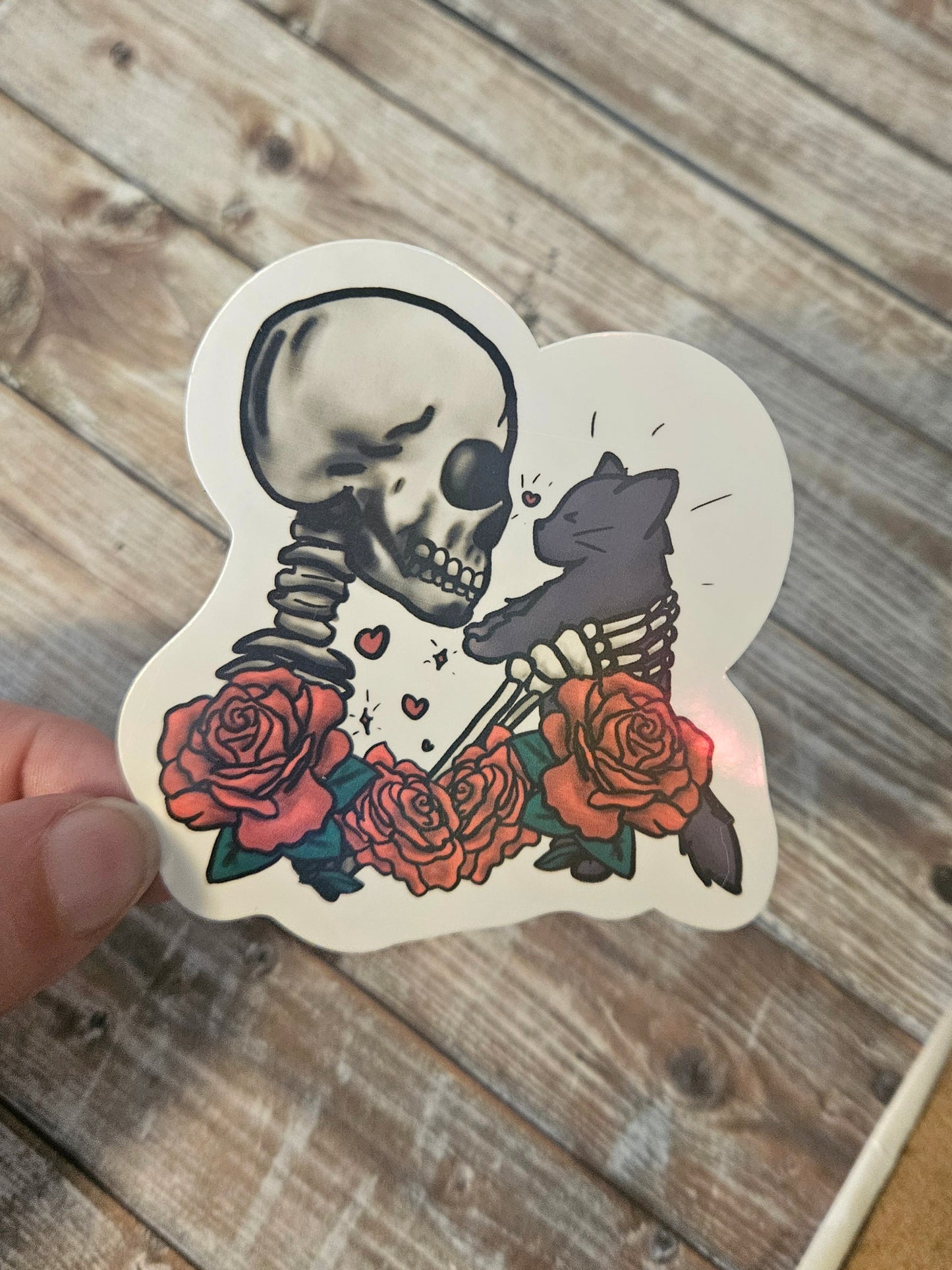 Skeleton holding kitty sticker for water bottle