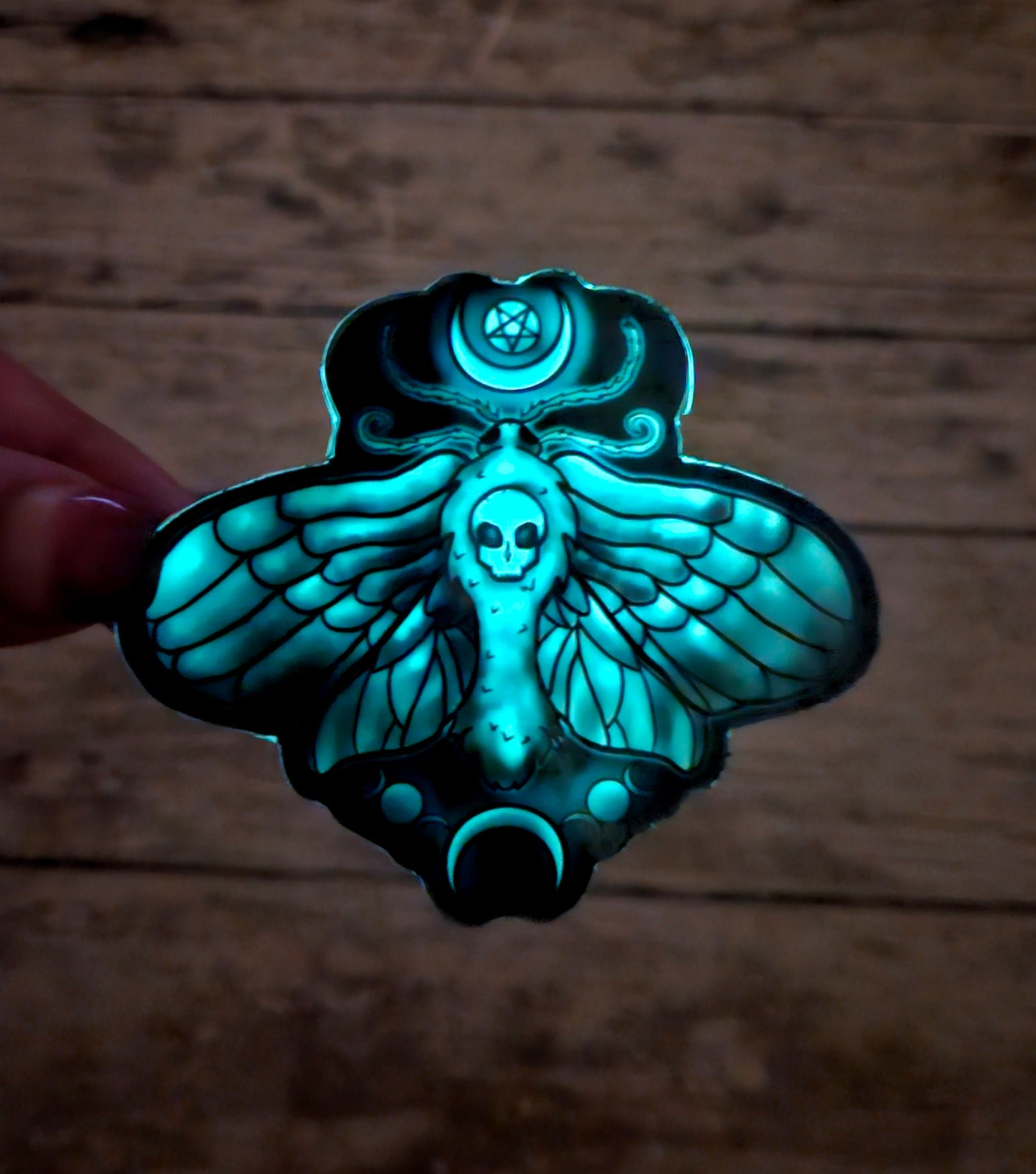 Glow in the death moth sticker