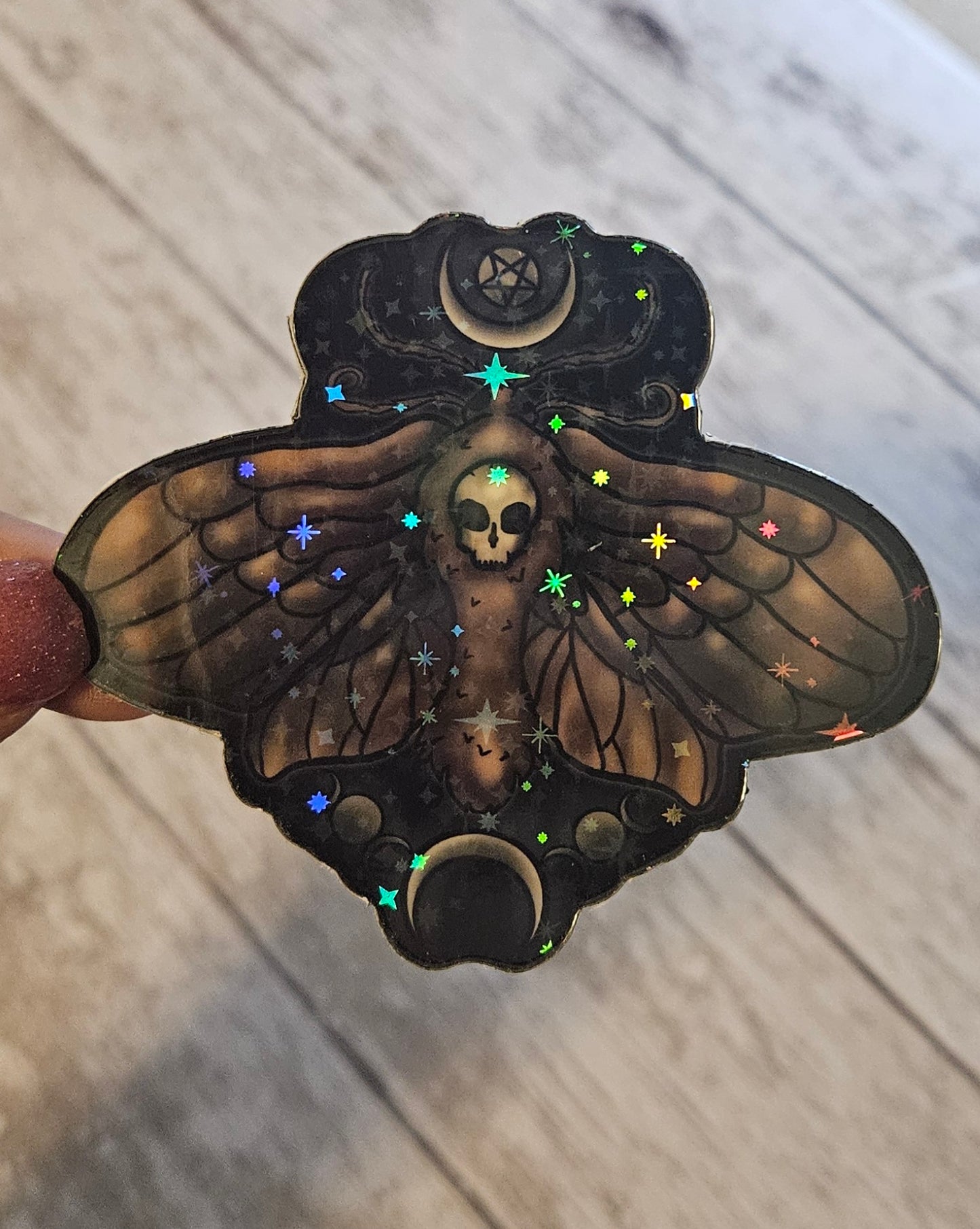 Glow in the death moth sticker