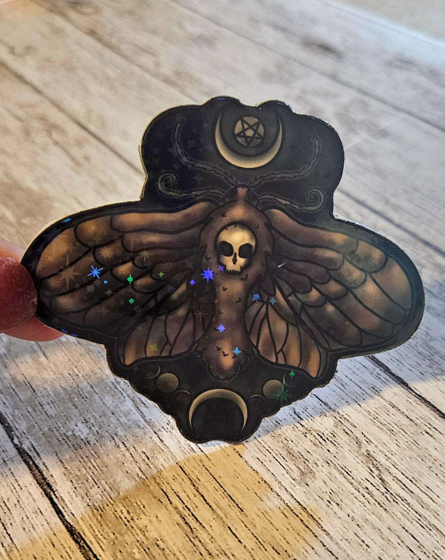 Glow in the death moth sticker