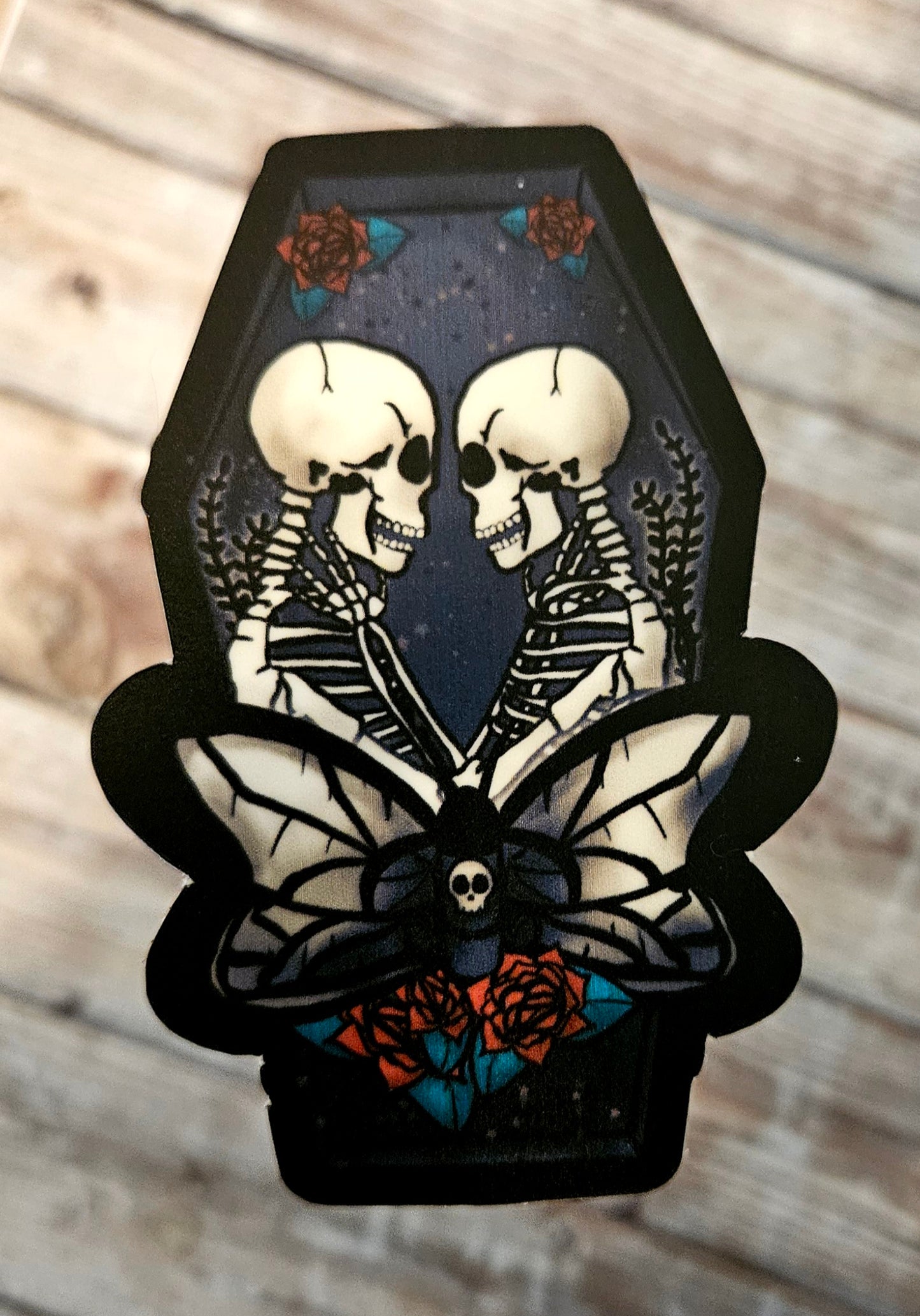Skeleton lovers in a coffin sticker