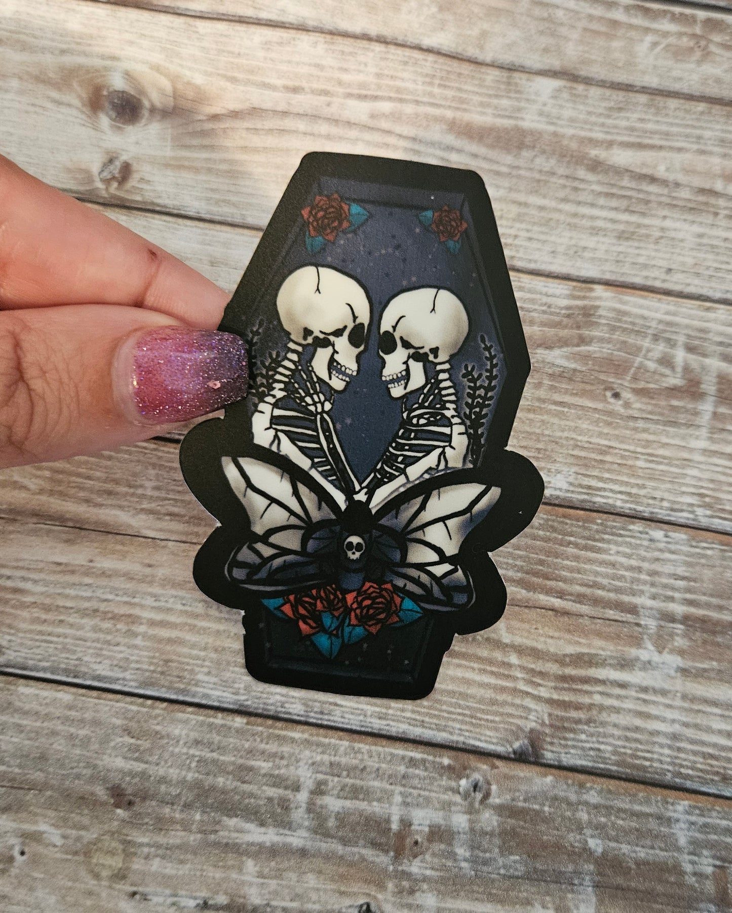 Skeleton lovers in a coffin sticker