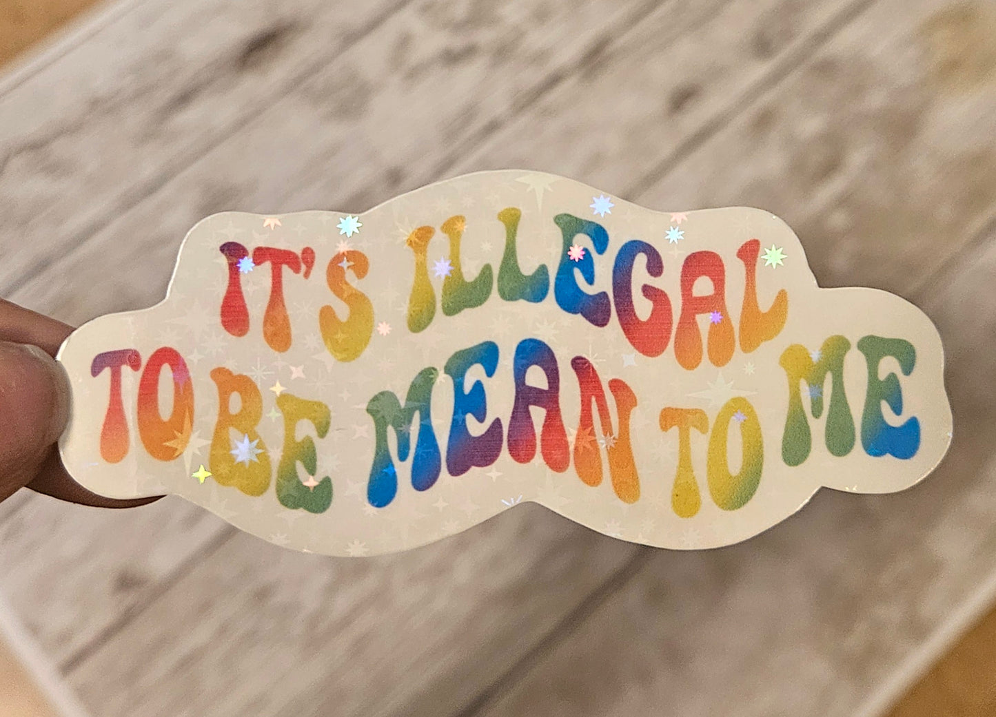 It's illegal to be mean to me sticker