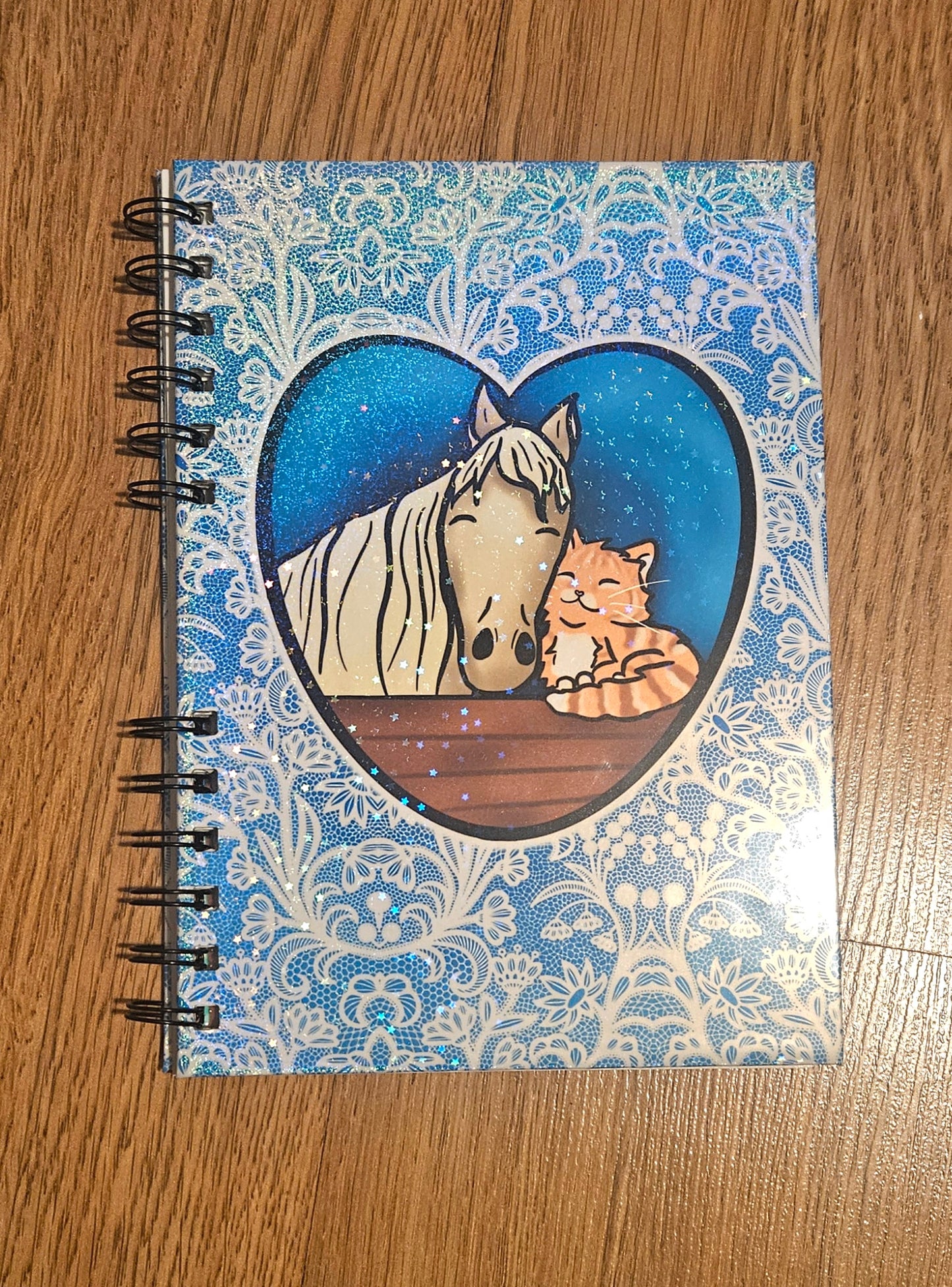 Snuggly horse and cat Sparkly Reusable sticker book for sticker hoarders (hard back)
