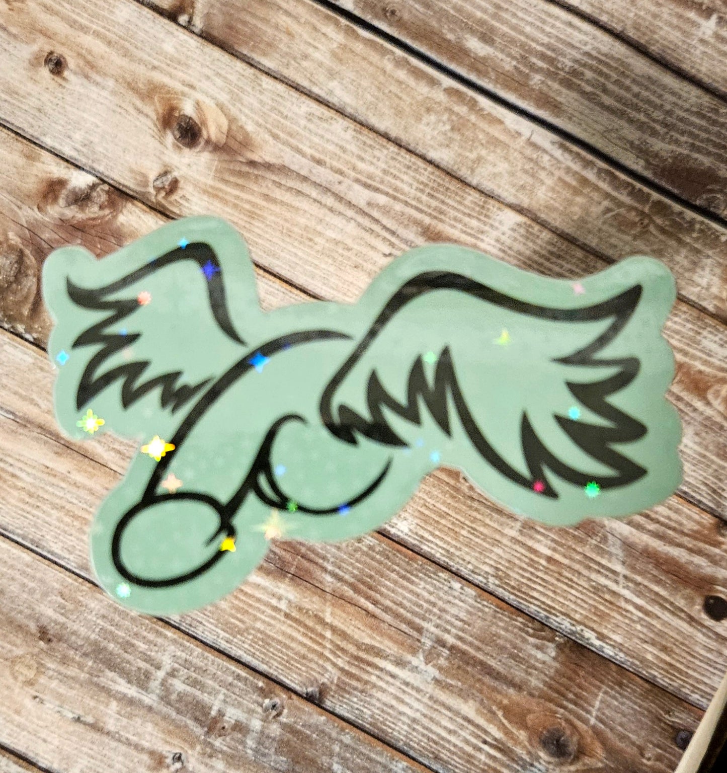 Glow in the dark peen with wings sticker