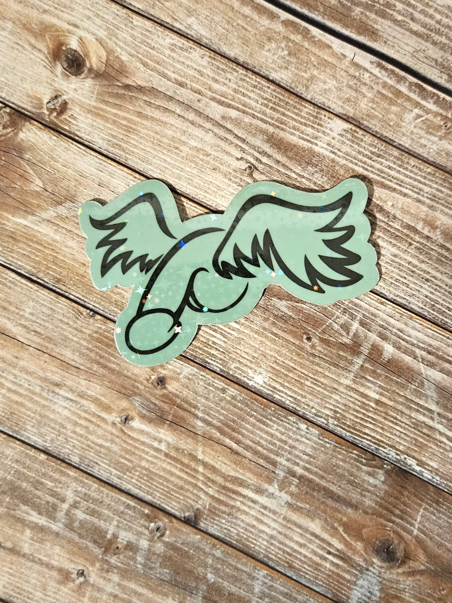 Glow in the dark peen with wings sticker