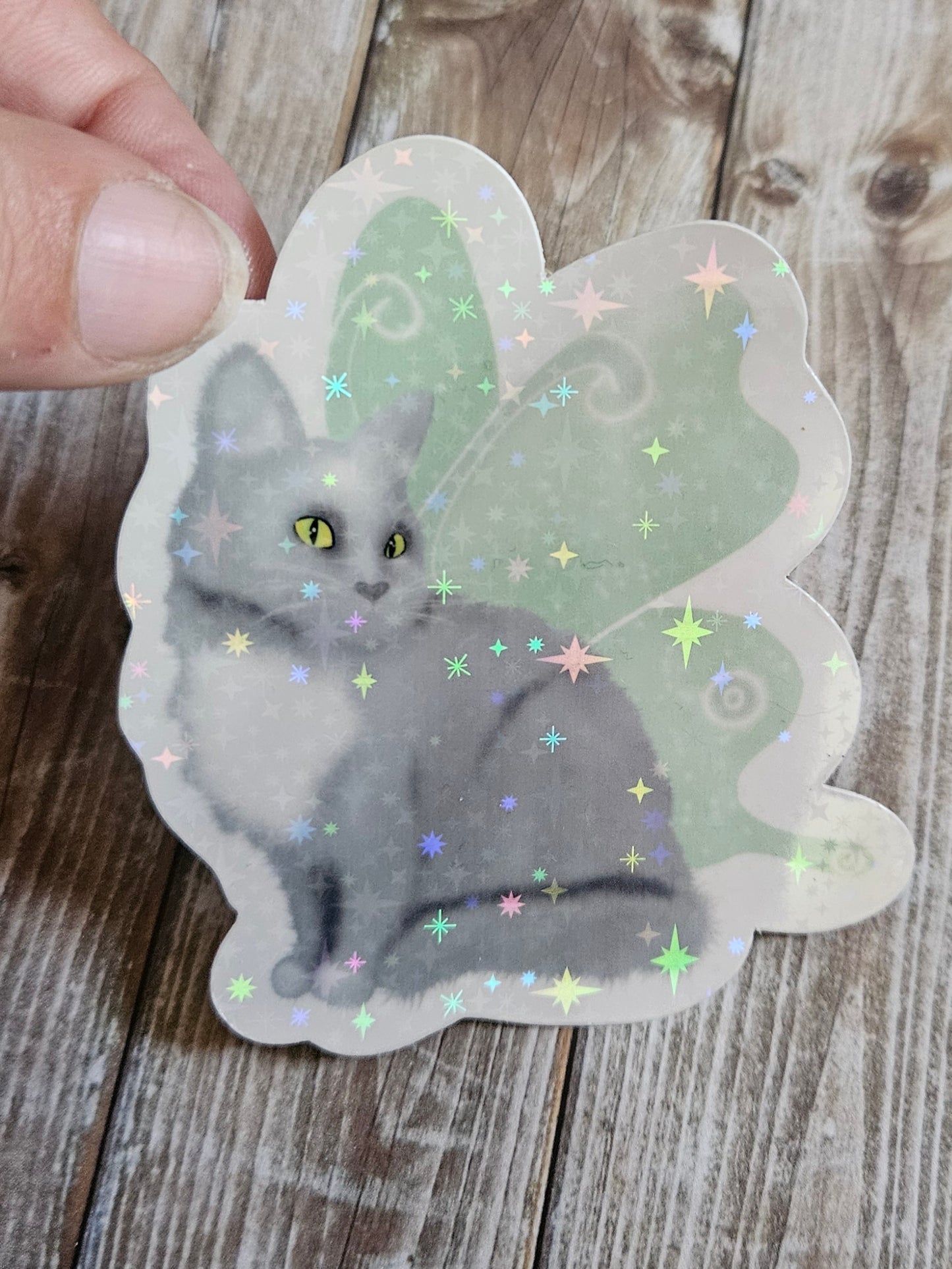 Gray cat with fairy wings sticker for water bottle