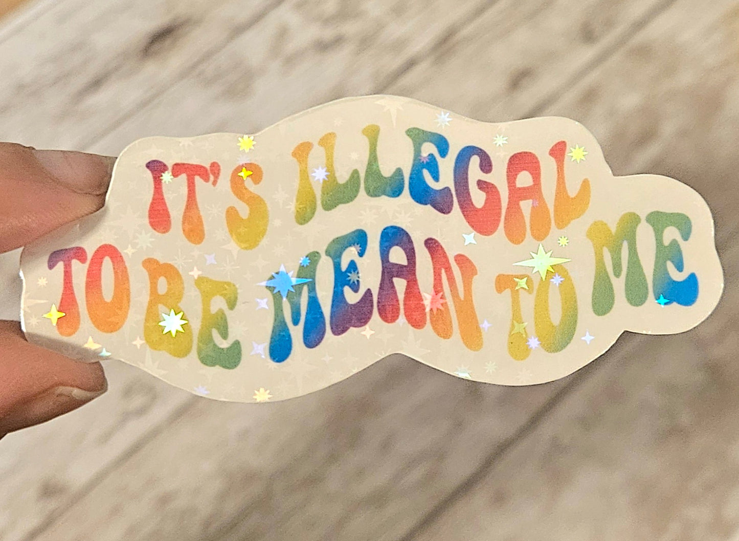 It's illegal to be mean to me sticker