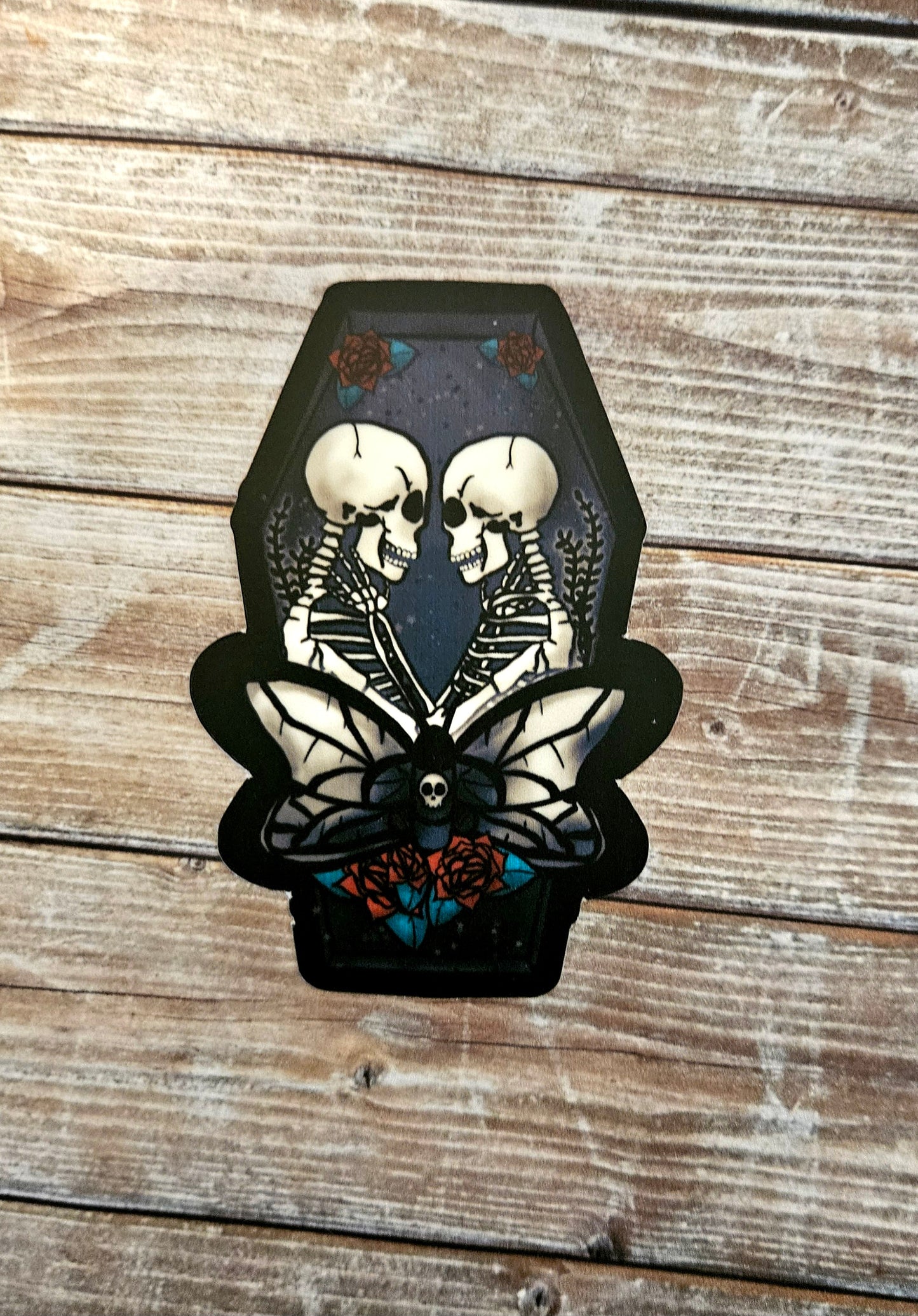 Skeleton lovers in a coffin sticker
