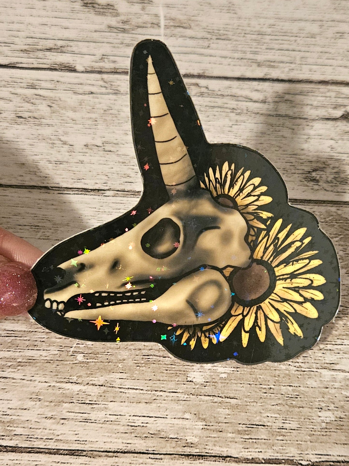 Glow in the dark unicorn skull sticker