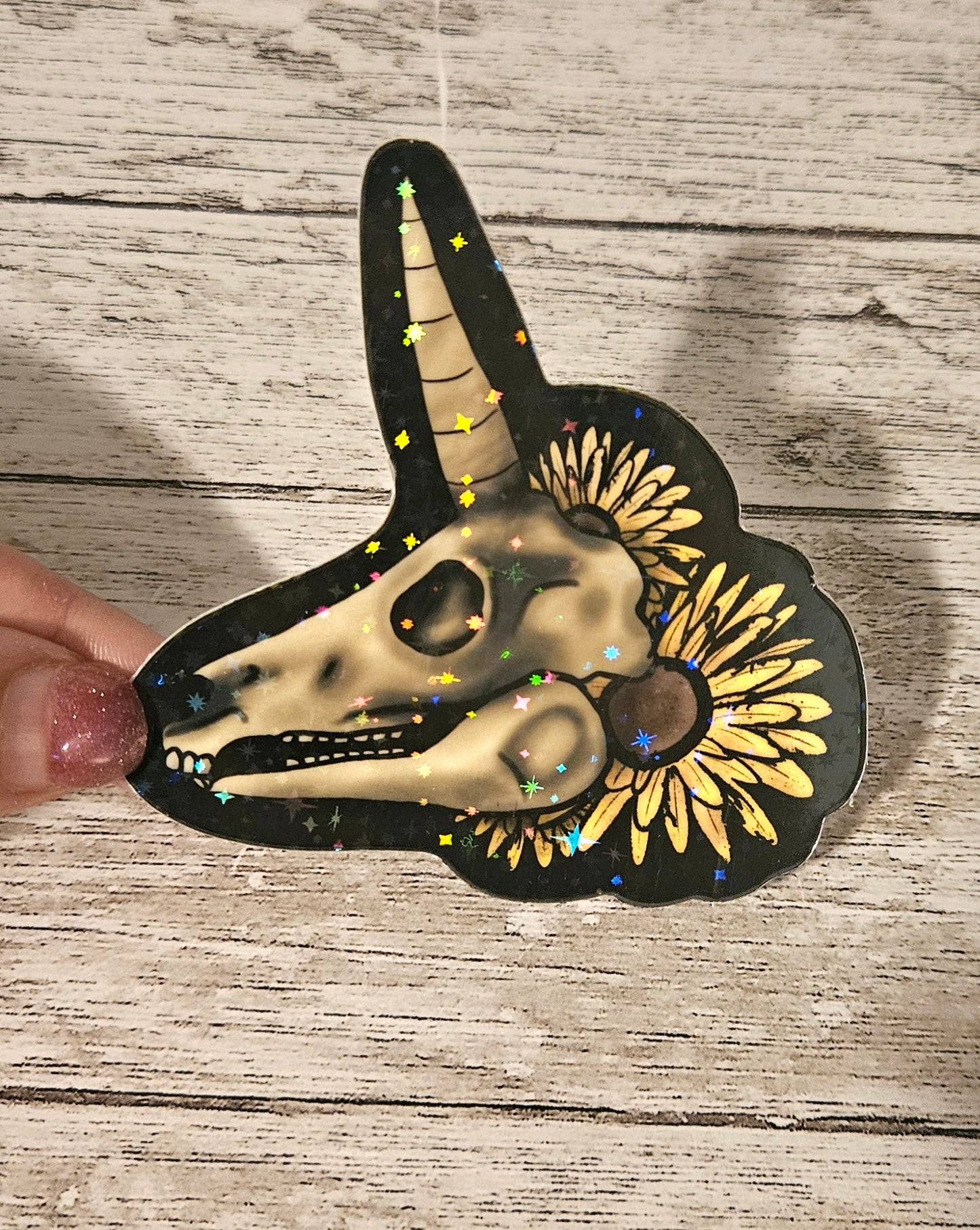 Glow in the dark unicorn skull sticker