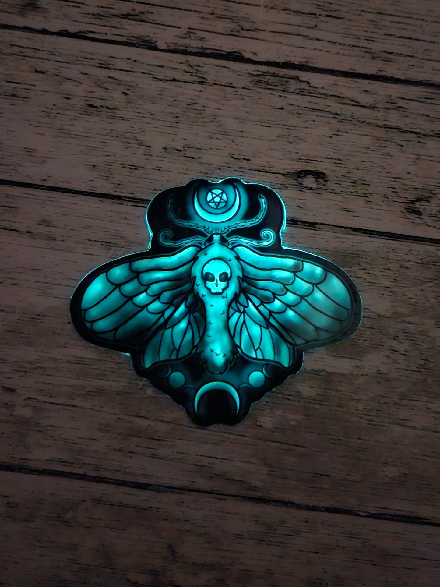 Glow in the death moth sticker