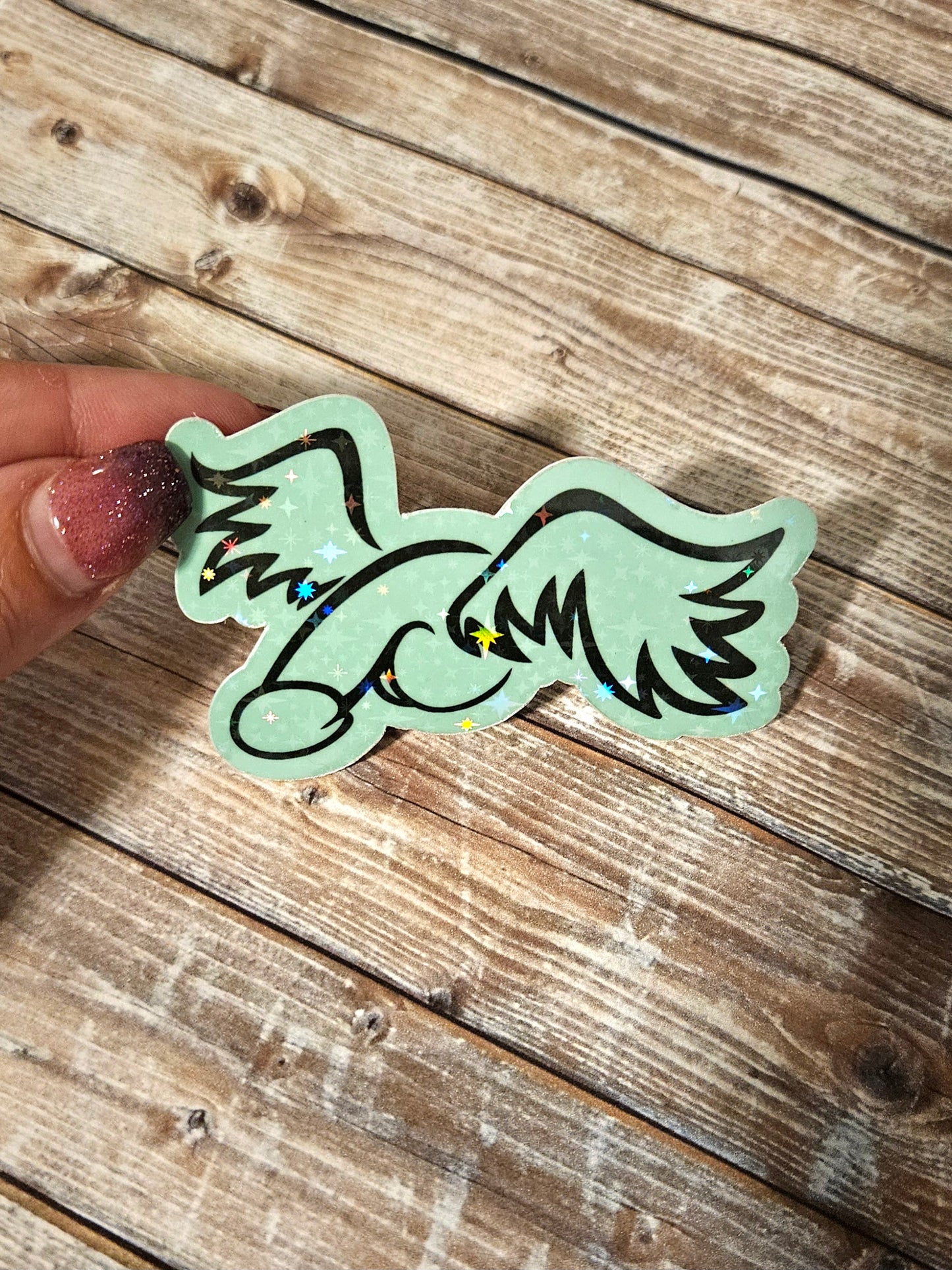 Glow in the dark peen with wings sticker