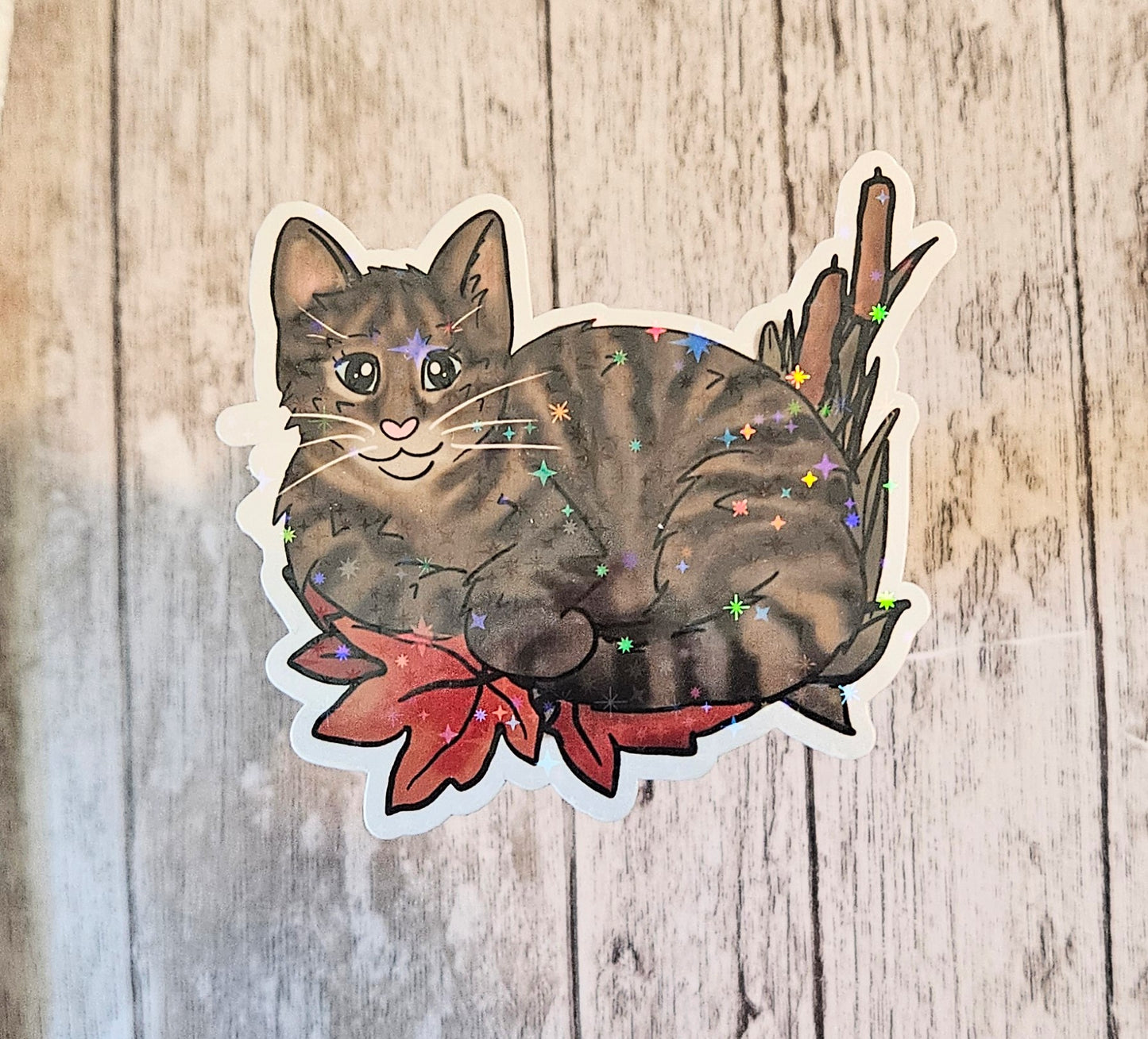Tabby cat in leaves sticker
