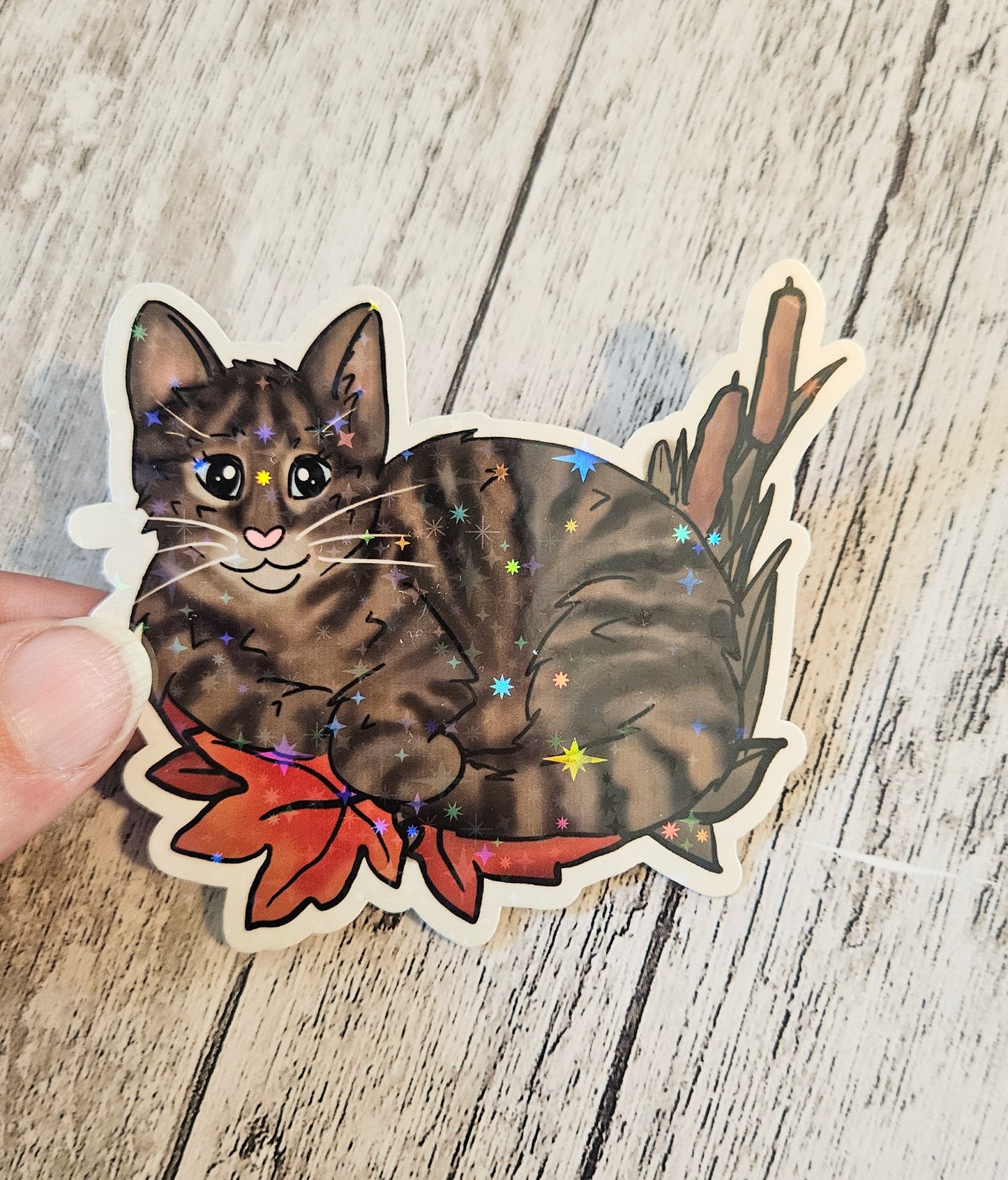 Tabby cat in leaves sticker