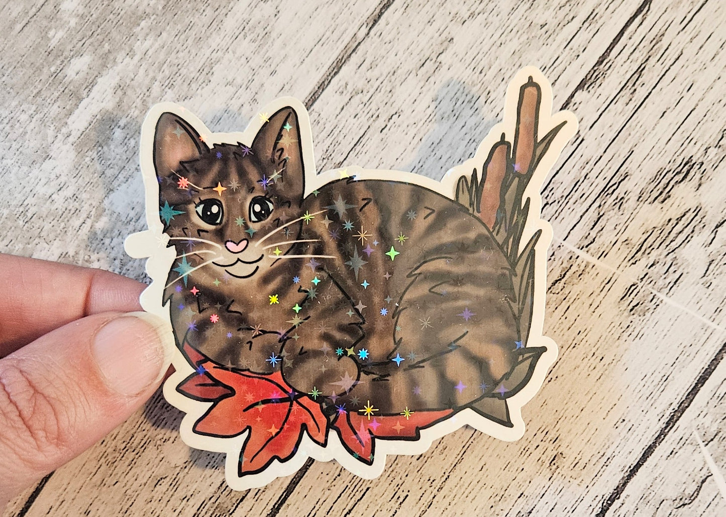 Tabby cat in leaves sticker