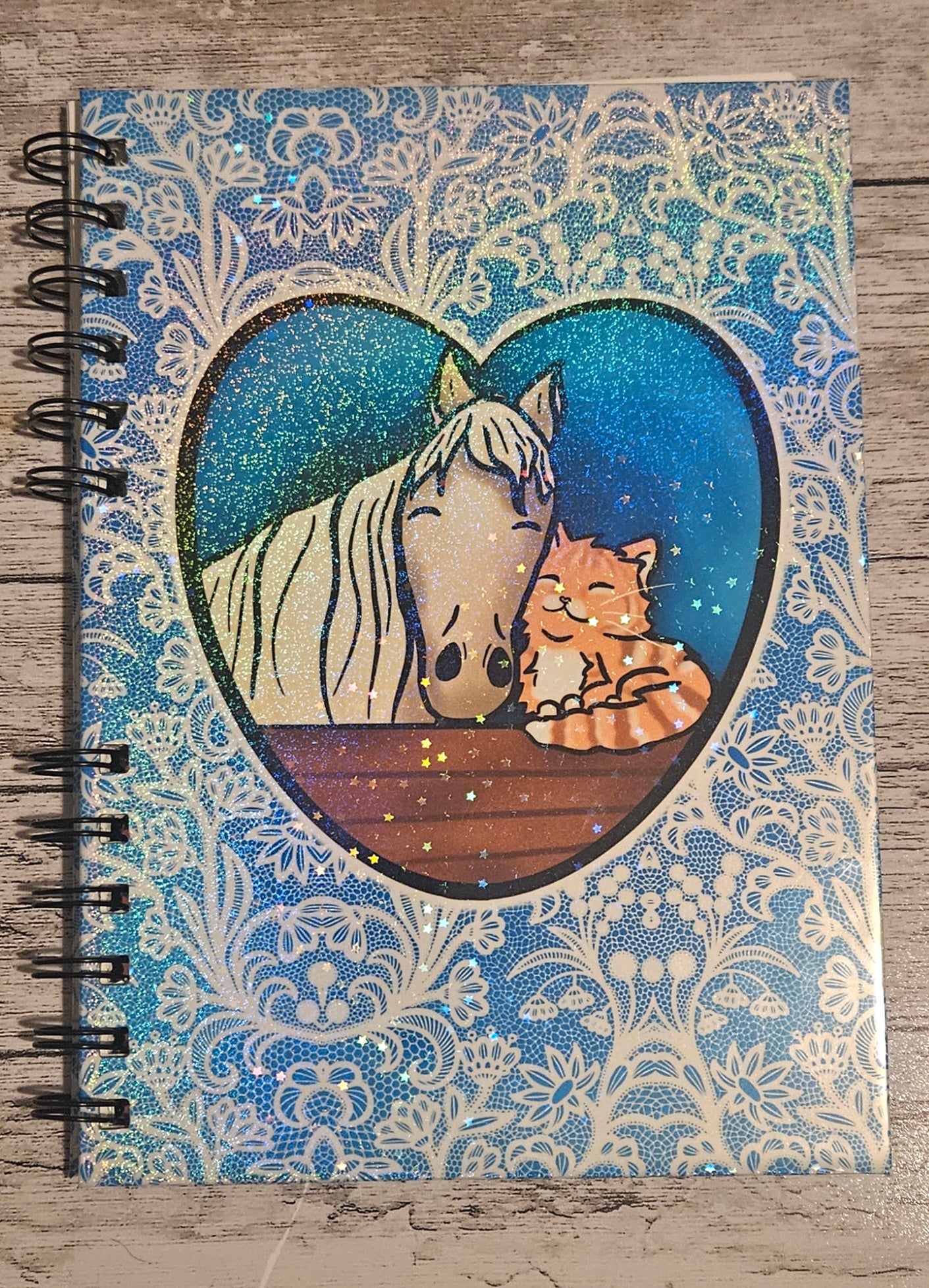 Snuggly horse and cat Sparkly Reusable sticker book for sticker hoarders (hard back)