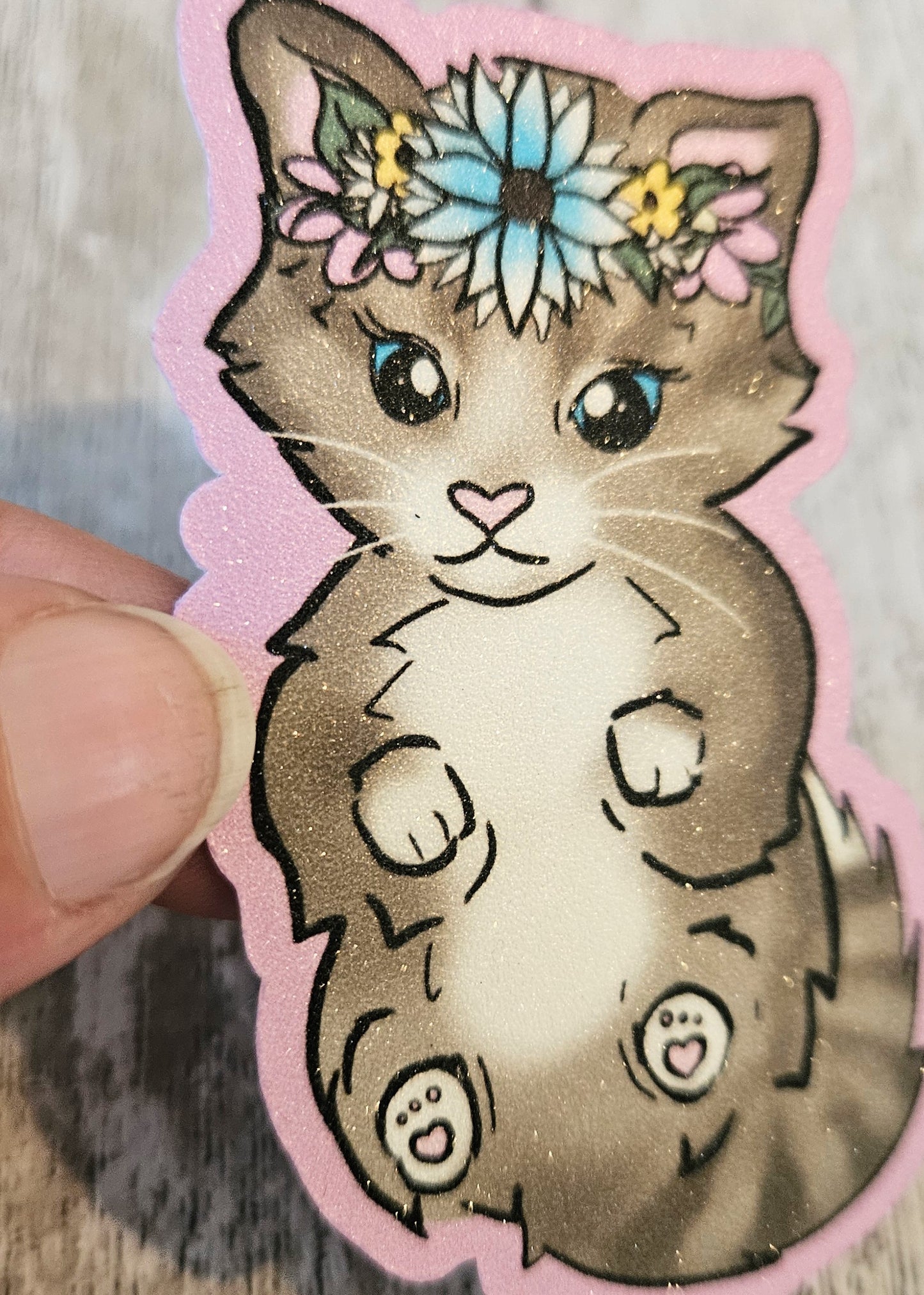 Sweet tabby kitten in a floral crown sticker