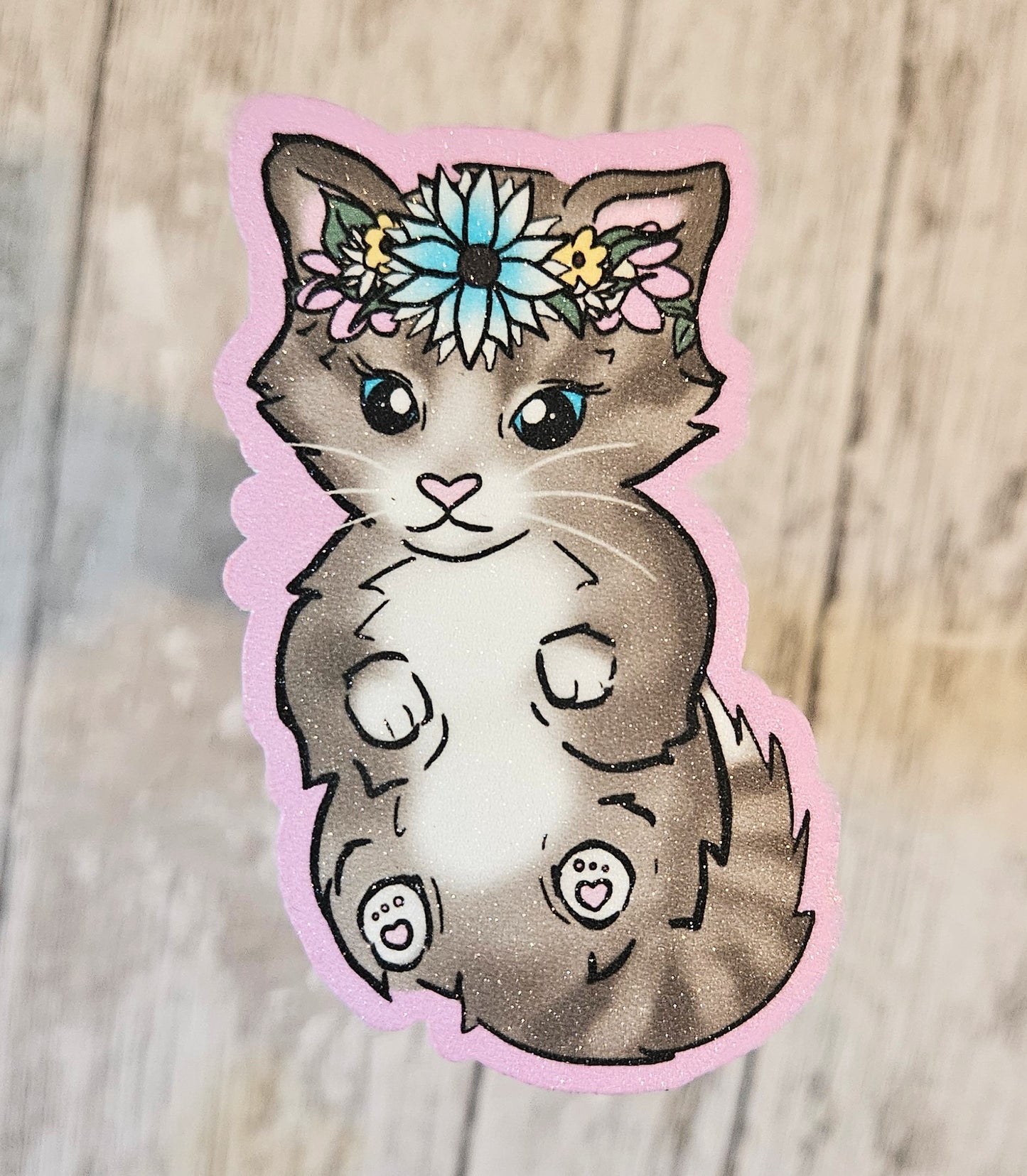 Sweet tabby kitten in a floral crown sticker