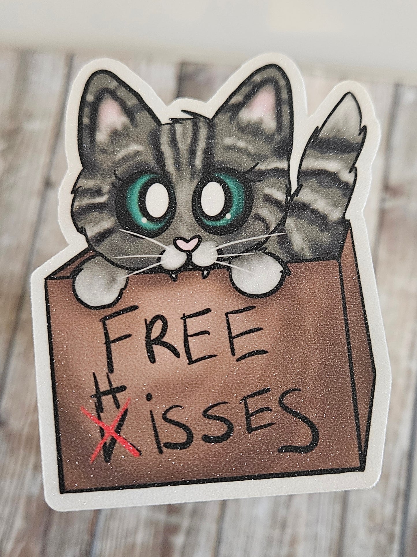 Free hisses tabby cat in a cardboard box sticker for water bottle