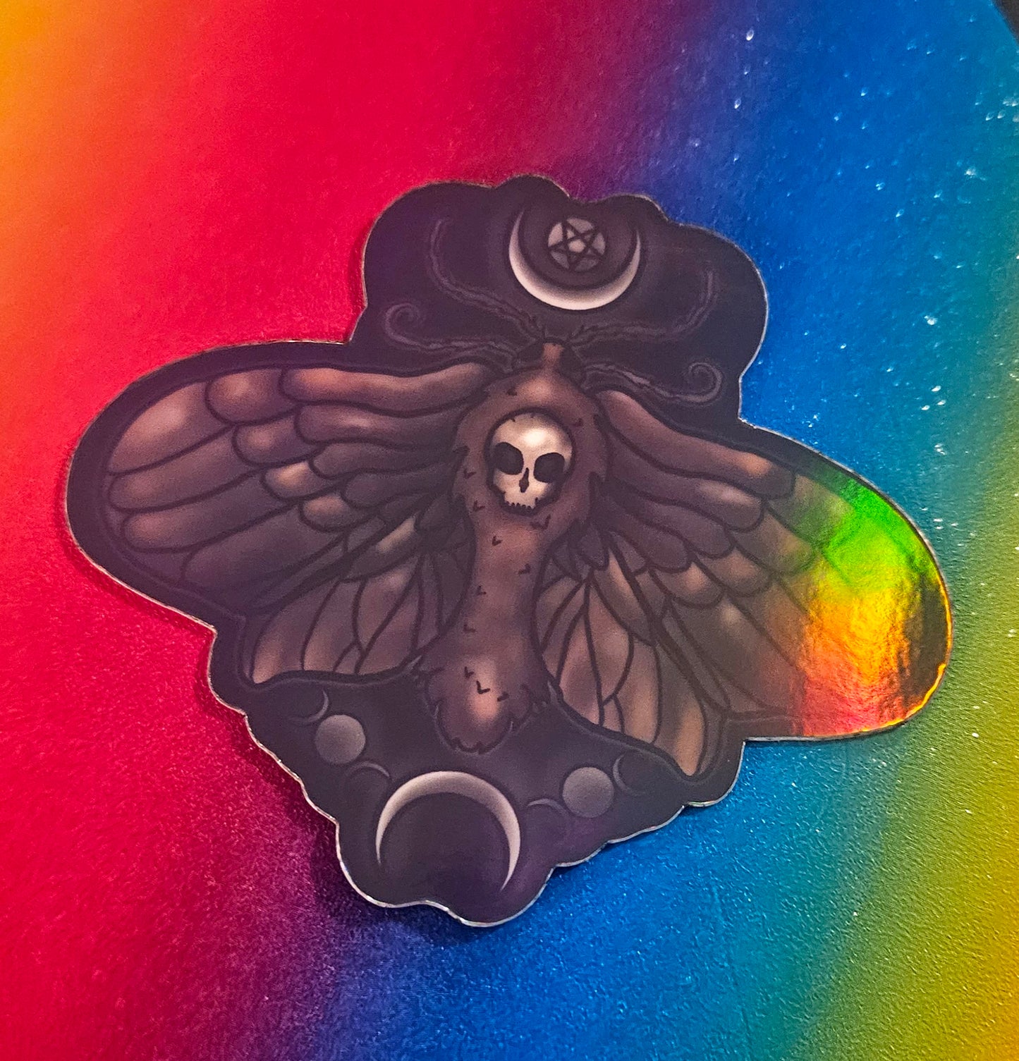 Glow in the death moth sticker