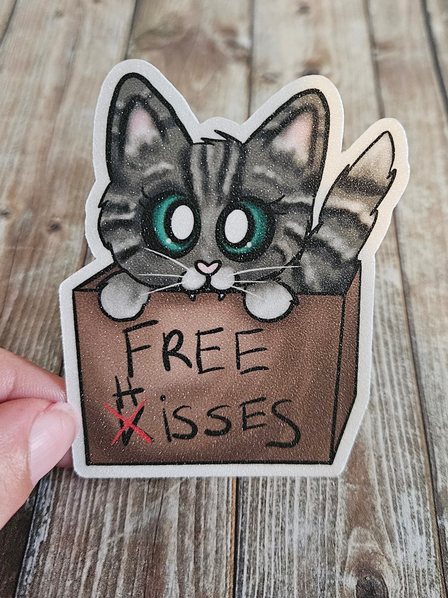 Free hisses tabby cat in a cardboard box sticker for water bottle