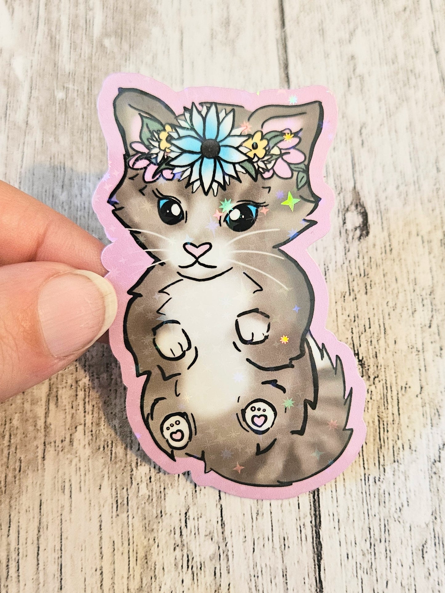 Sweet tabby kitten in a floral crown sticker