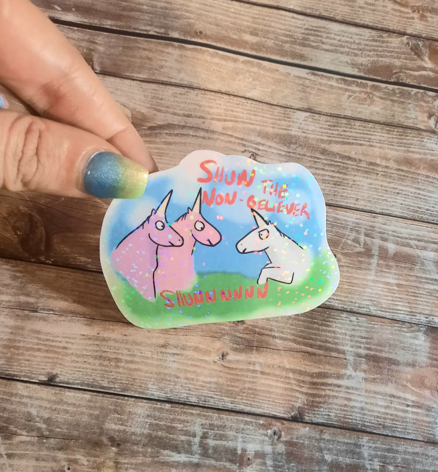 Shun the non believer unicorn sticker