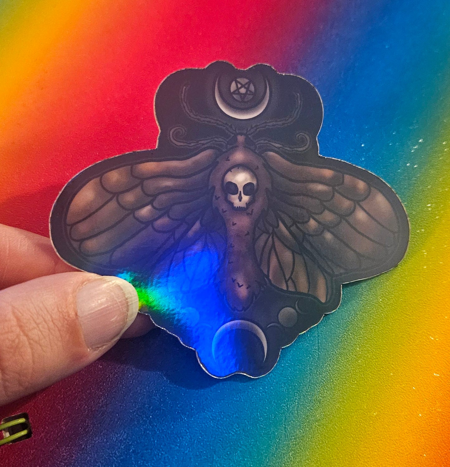 Glow in the death moth sticker