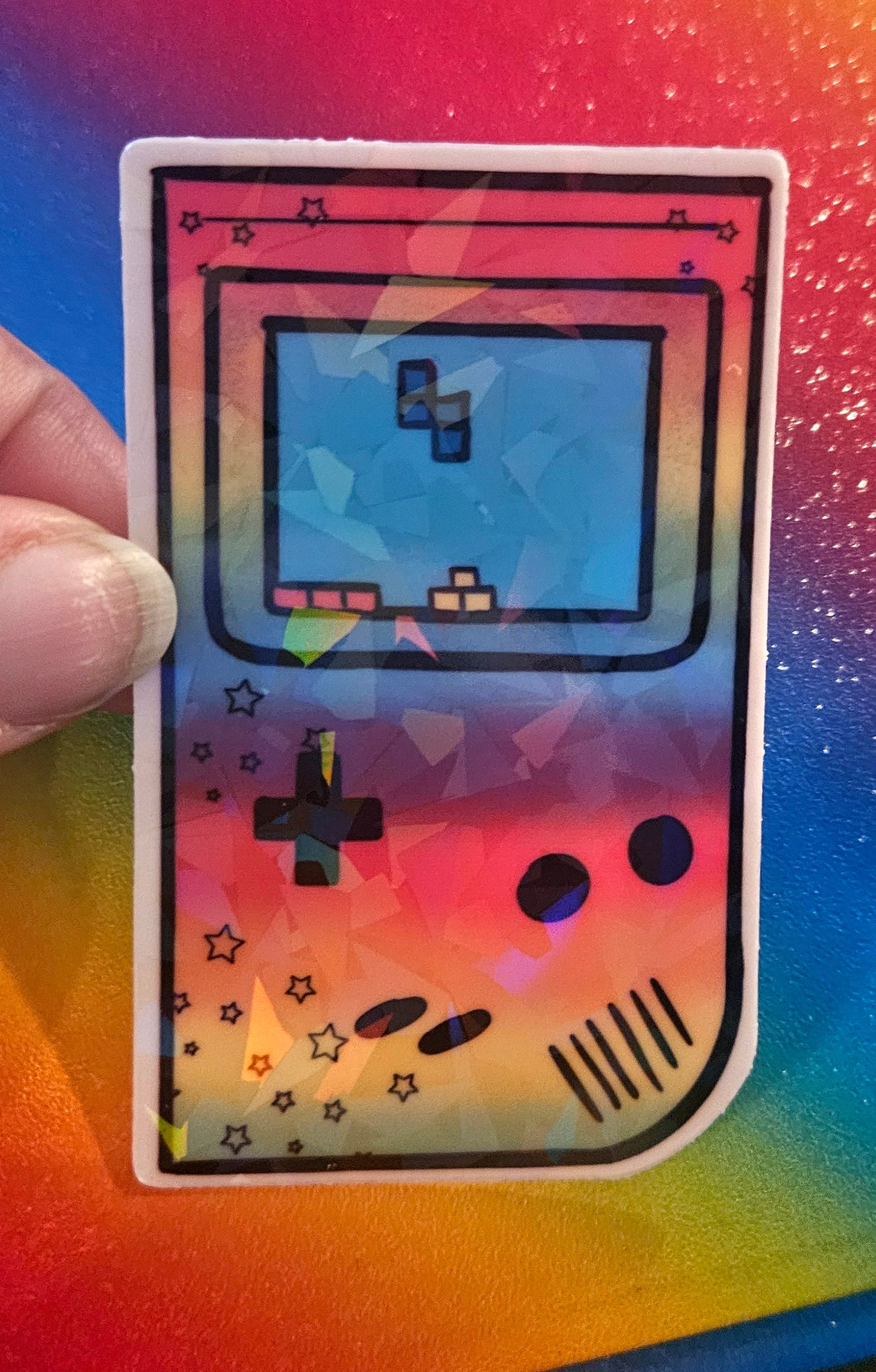 Hand held rainbow gaming sticker