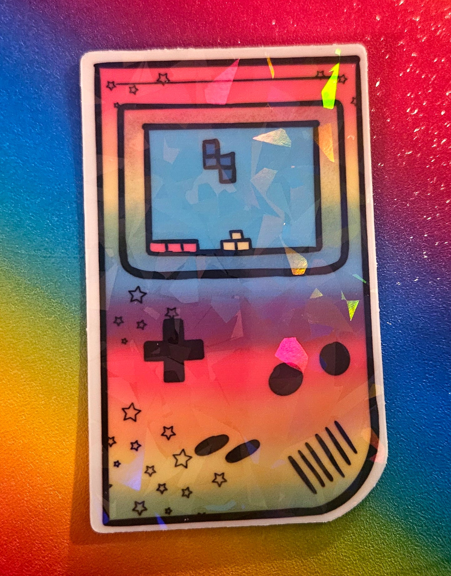 Hand held rainbow gaming sticker
