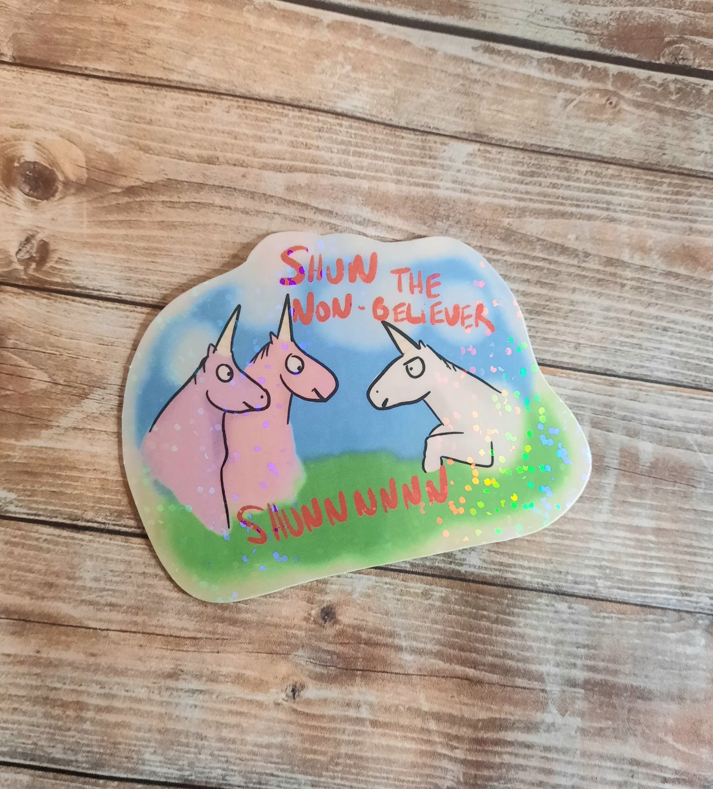 Shun the non believer unicorn sticker