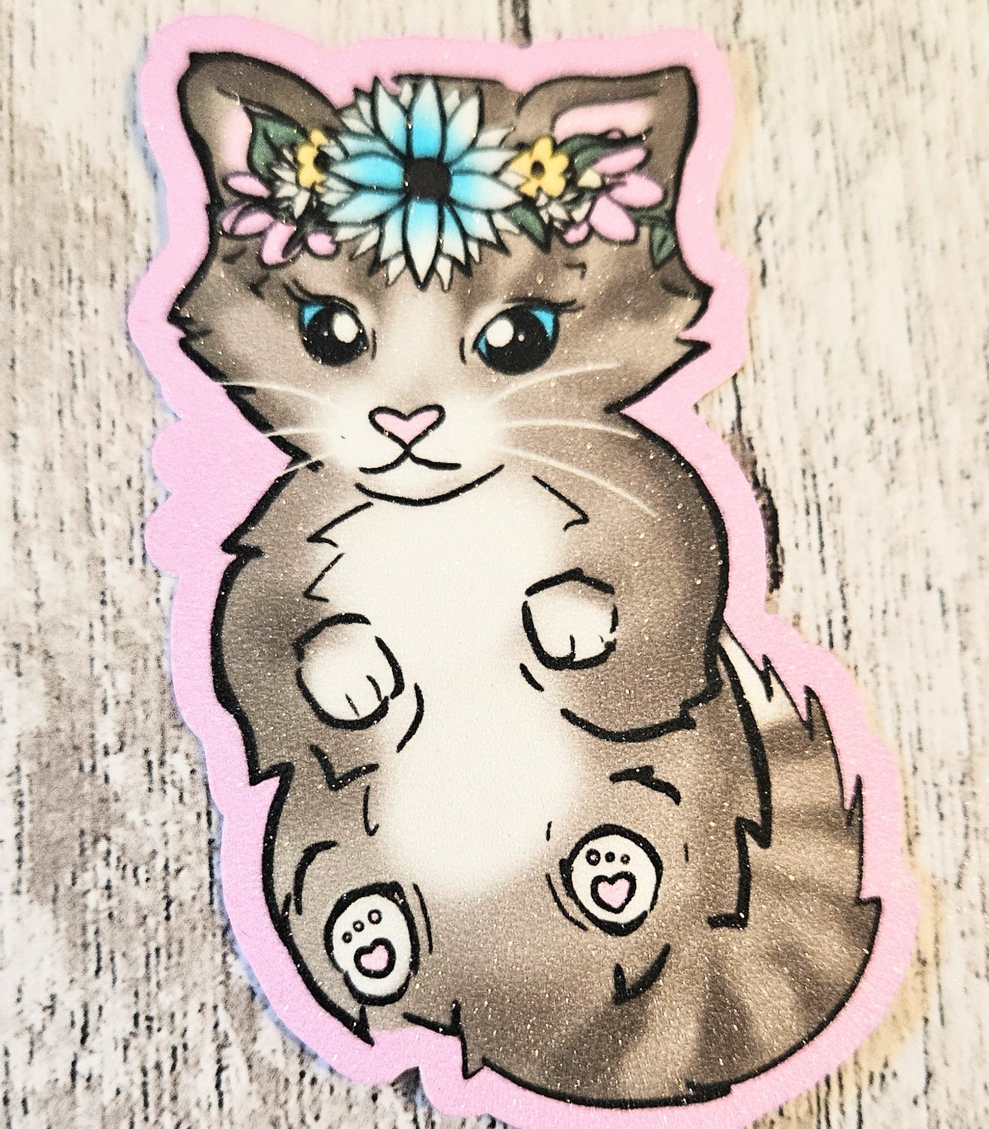 Sweet tabby kitten in a floral crown sticker