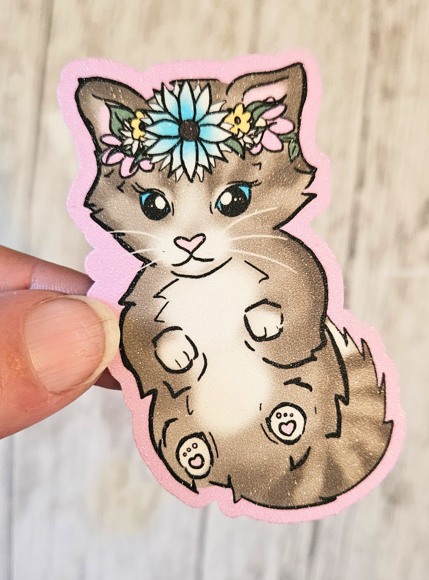 Sweet tabby kitten in a floral crown sticker