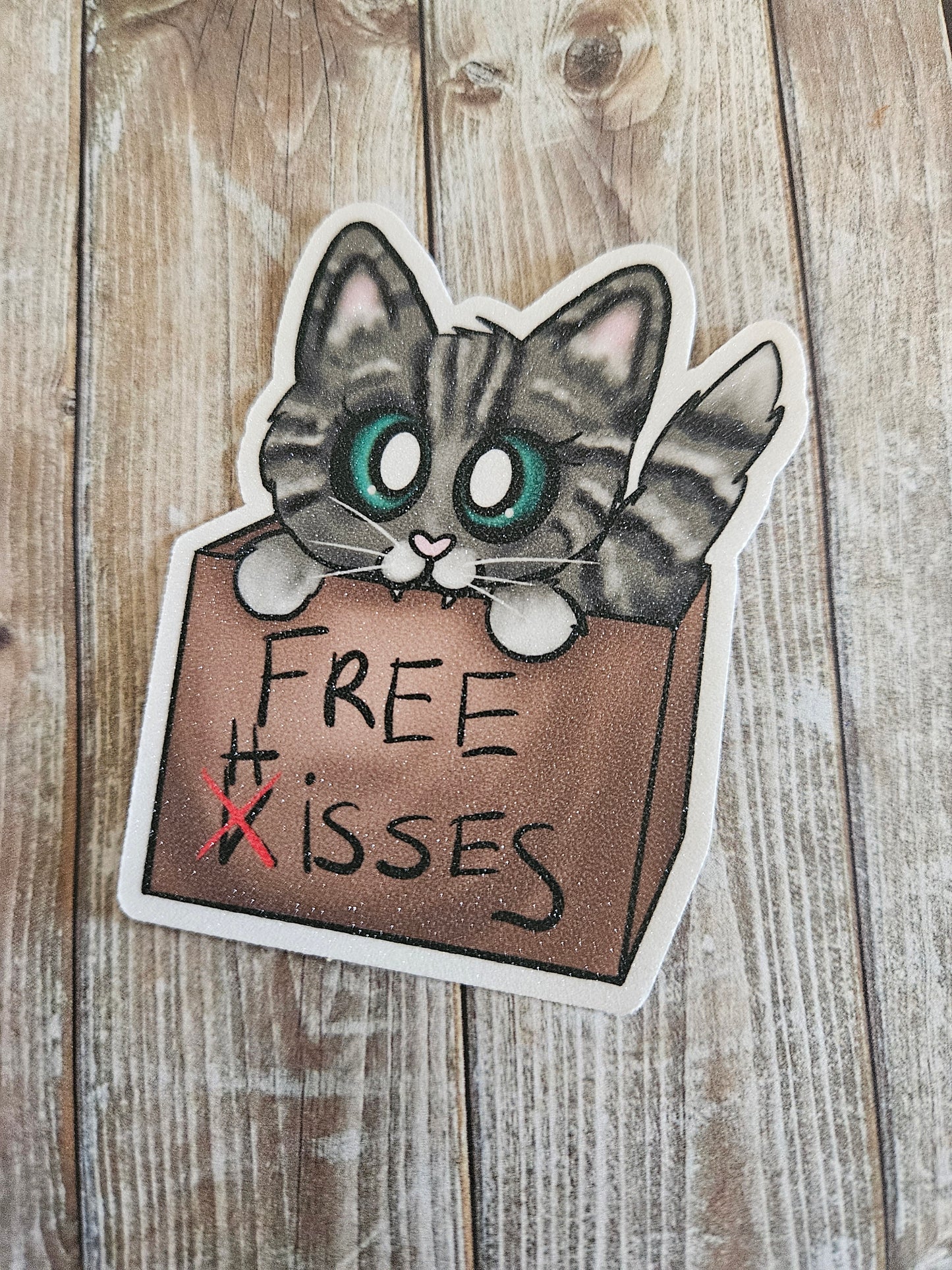 Free hisses tabby cat in a cardboard box sticker for water bottle