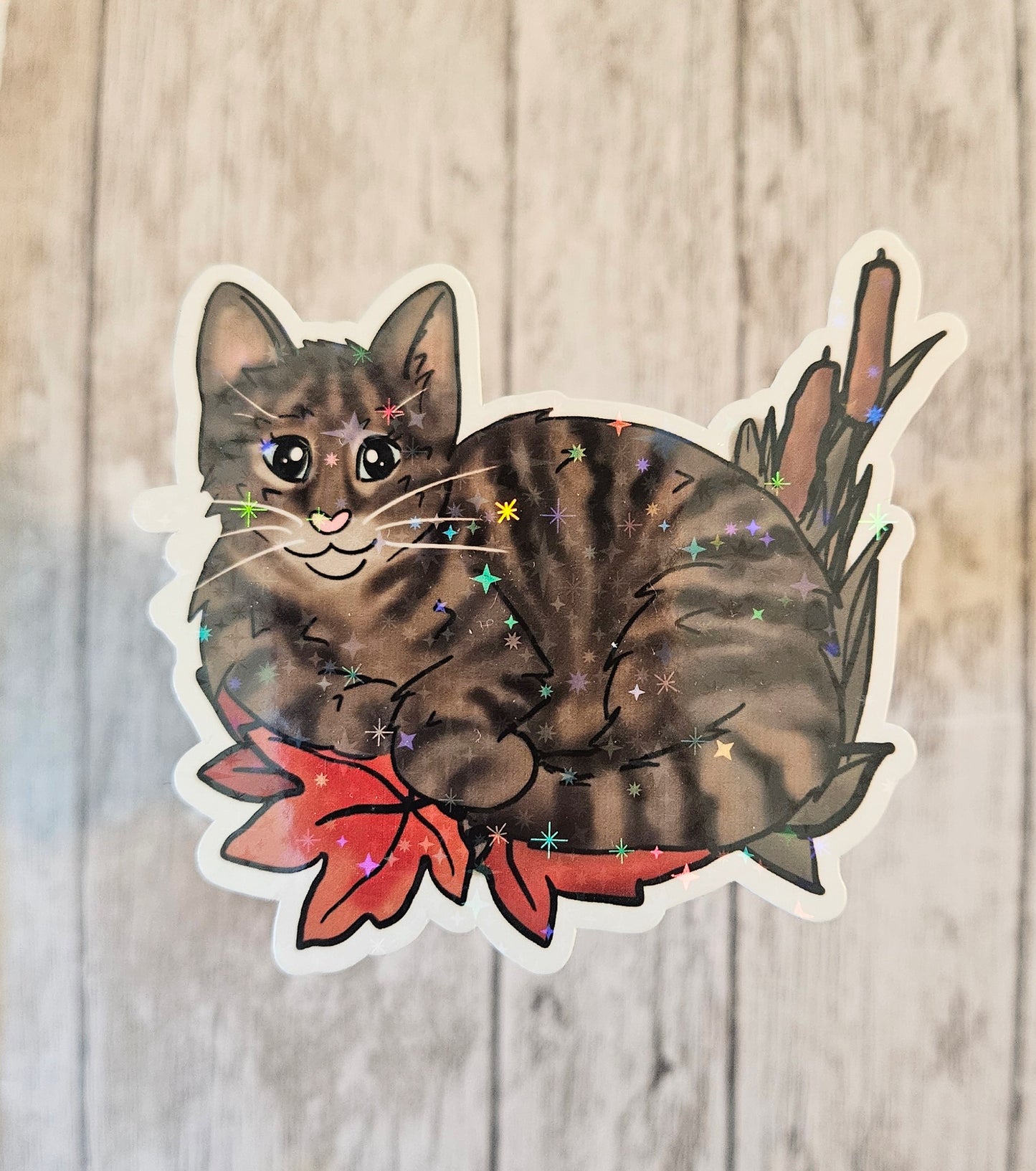 Tabby cat in leaves sticker