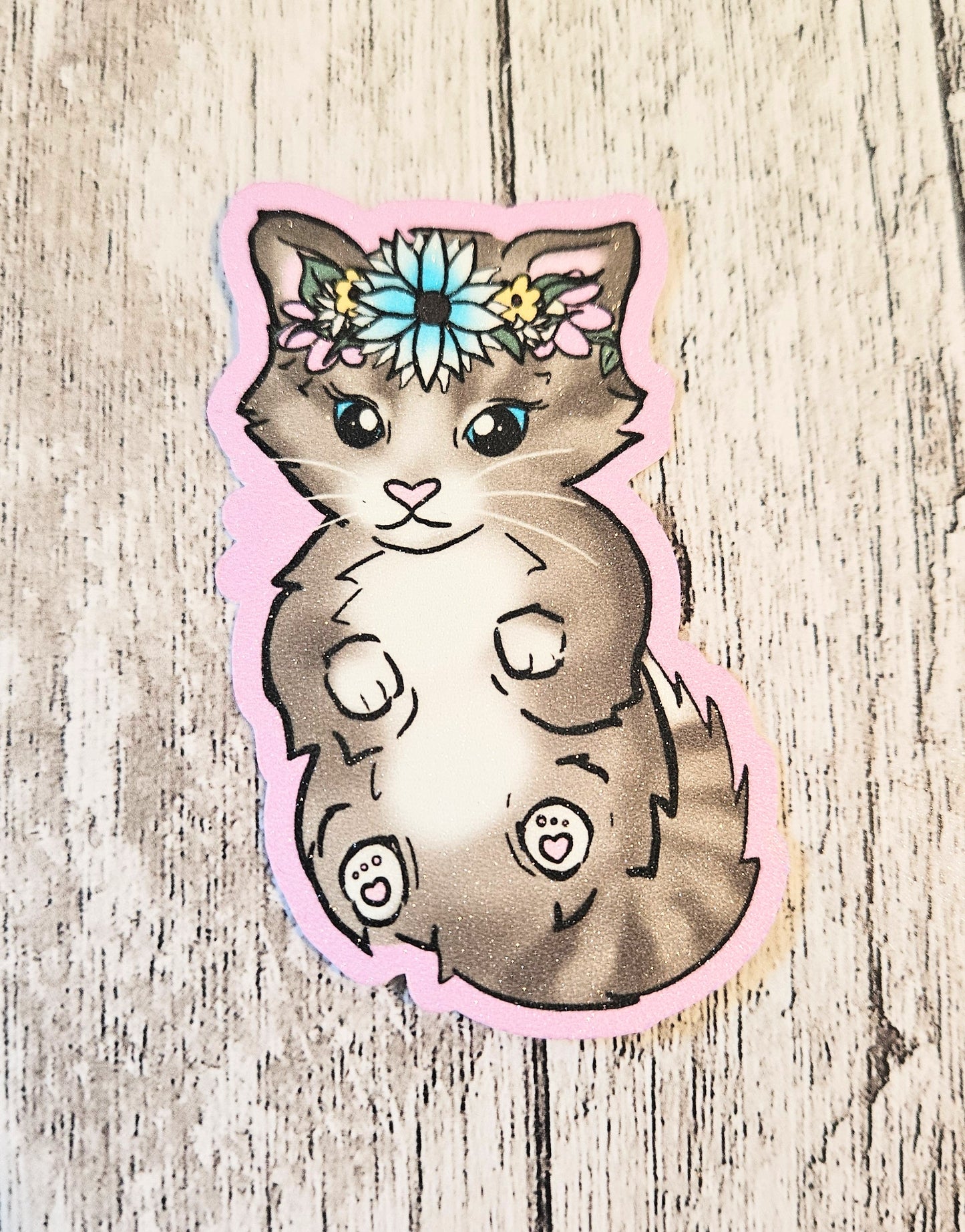 Sweet tabby kitten in a floral crown sticker