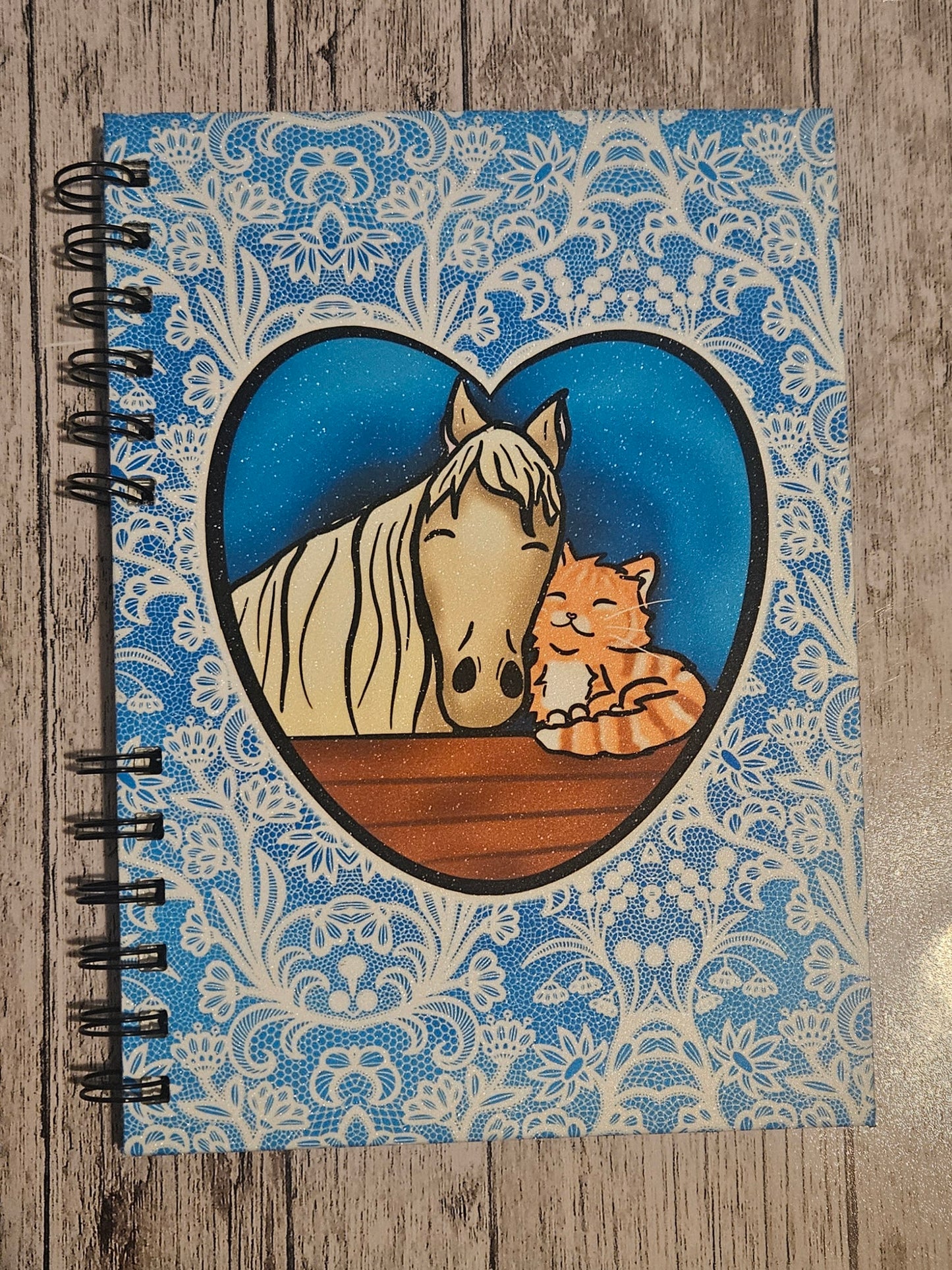 Snuggly horse and cat Sparkly Reusable sticker book for sticker hoarders (hard back)